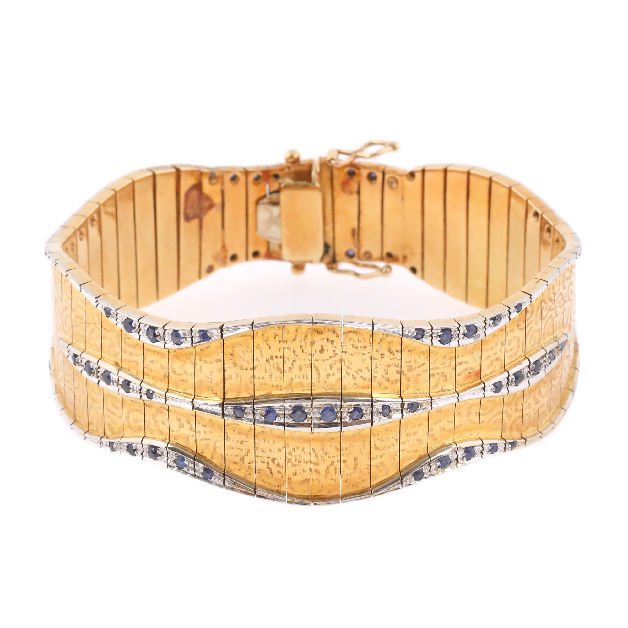 Two-tone gold bracelet, decorated with sapphires