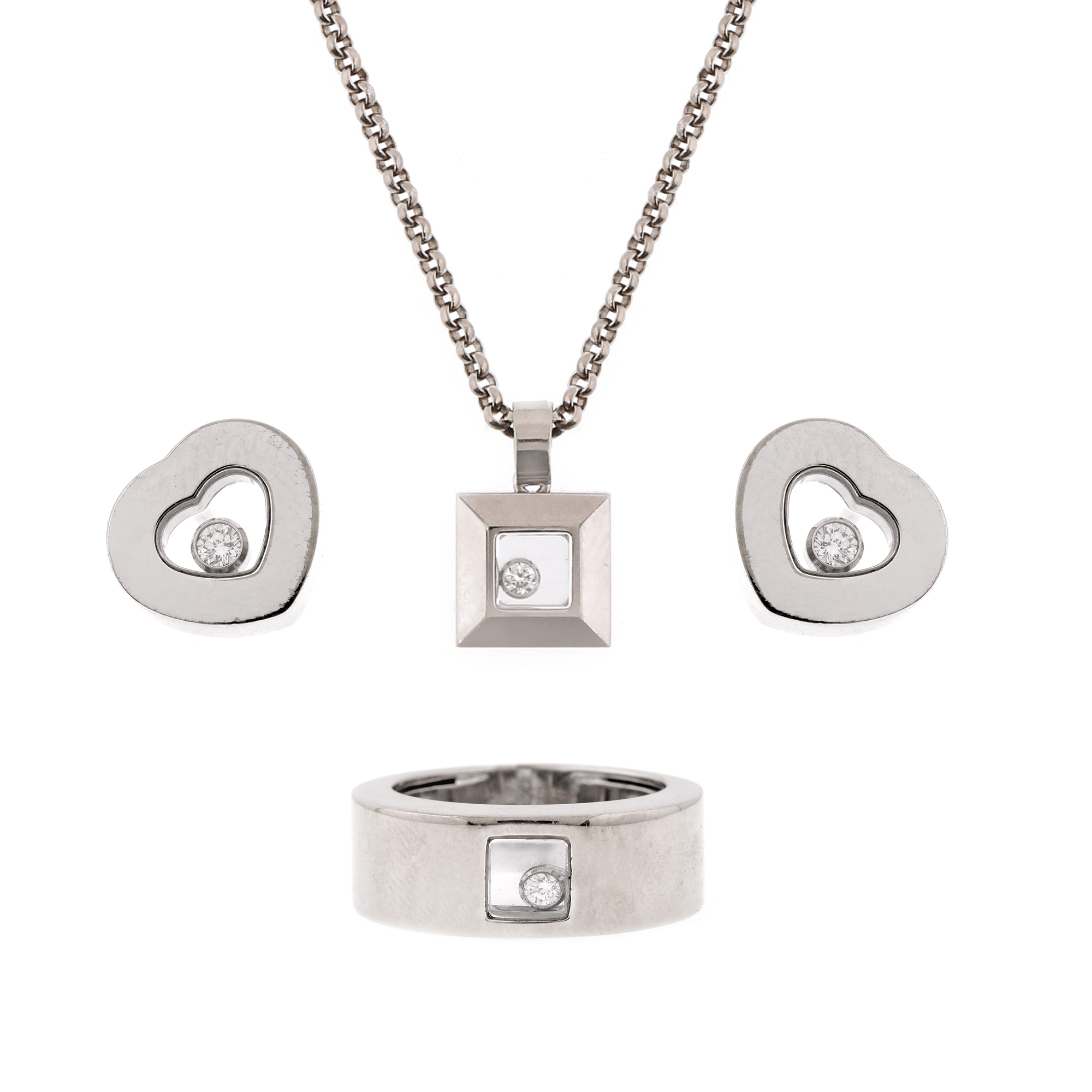 Set Chopard din aur alb, format din lanț cu pandantiv, pereche de cercei și inel, decorat cu diamante mobile