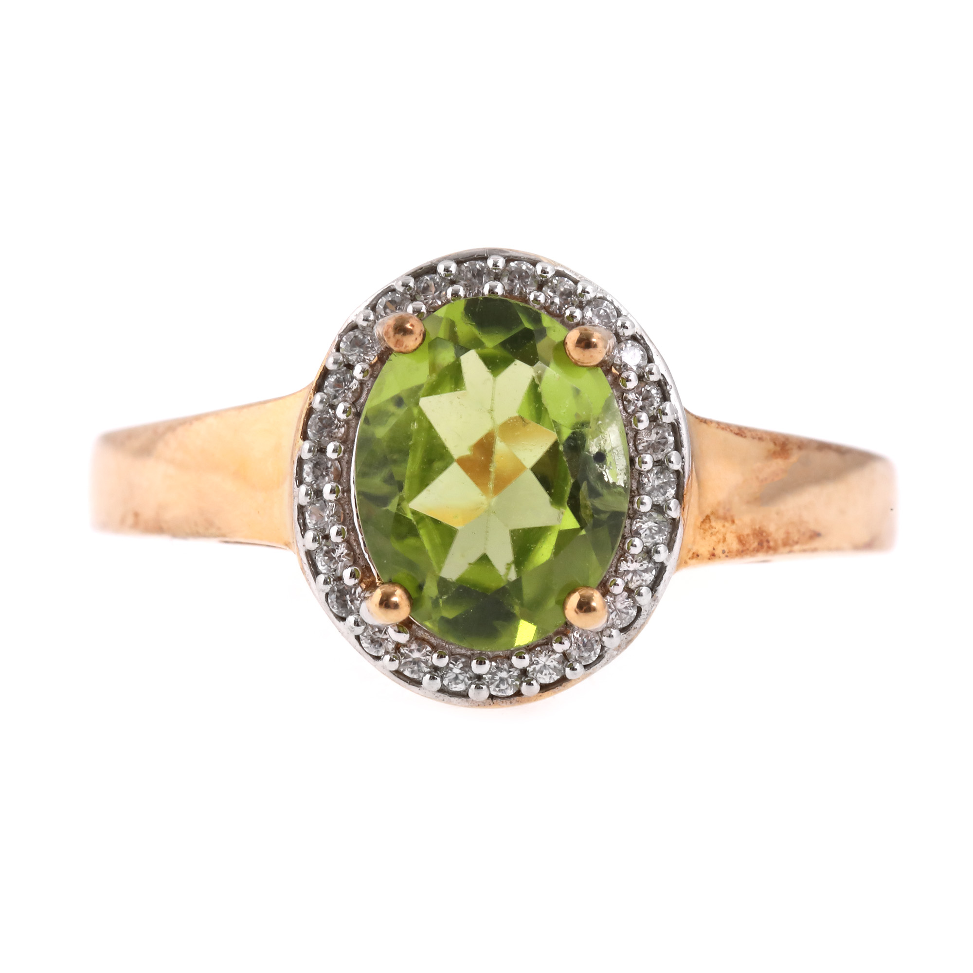 Gilded silver ring decorated with peridot and topazes