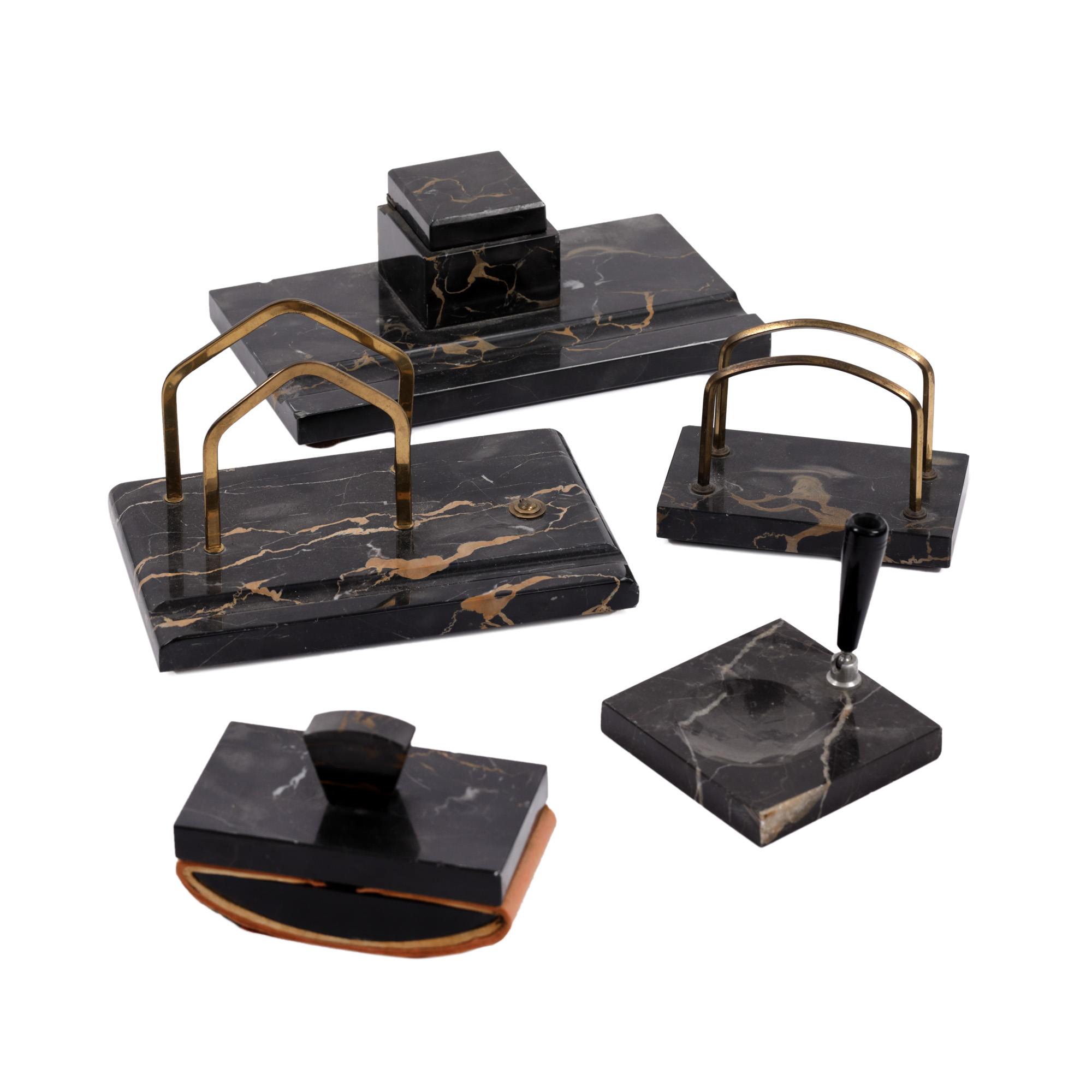 Desk set consisting of inkwell, two paper racks, ink blotter, pen holder