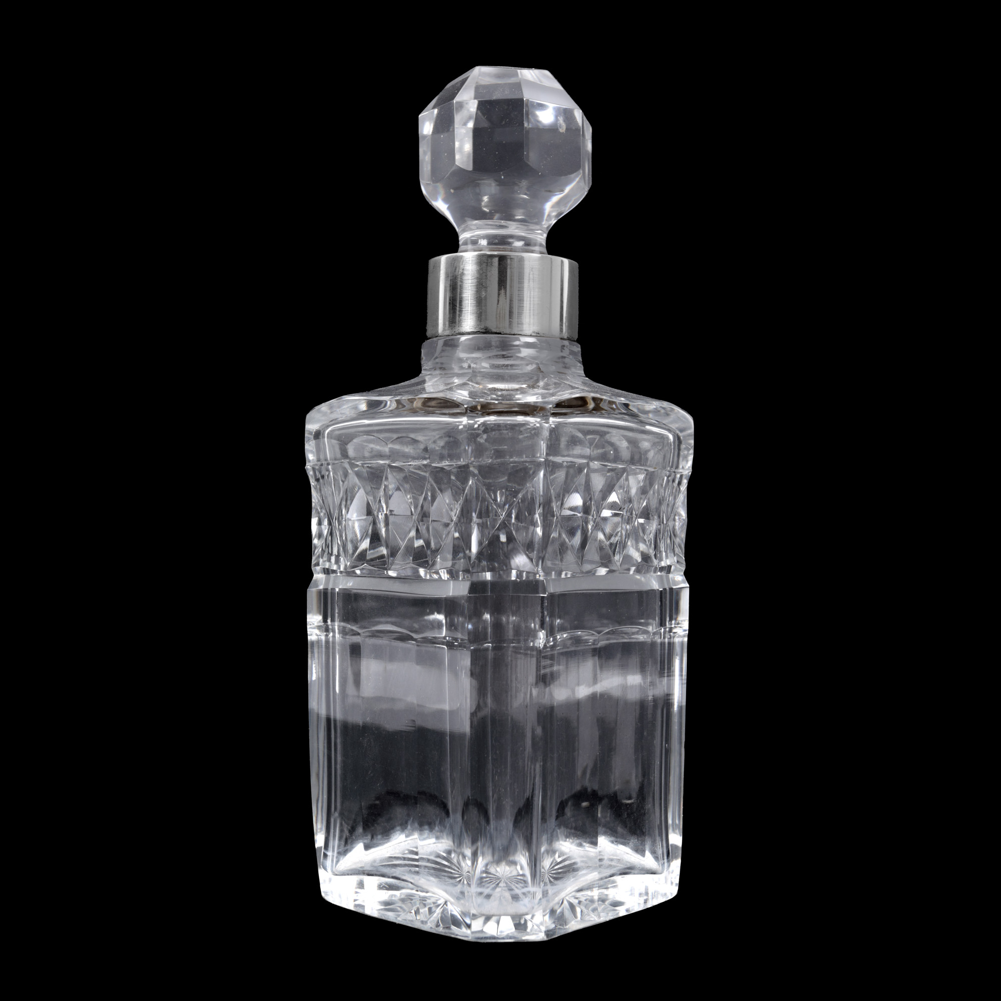Decanter for cognac or whisky, made of faceted crystal, with silver neck