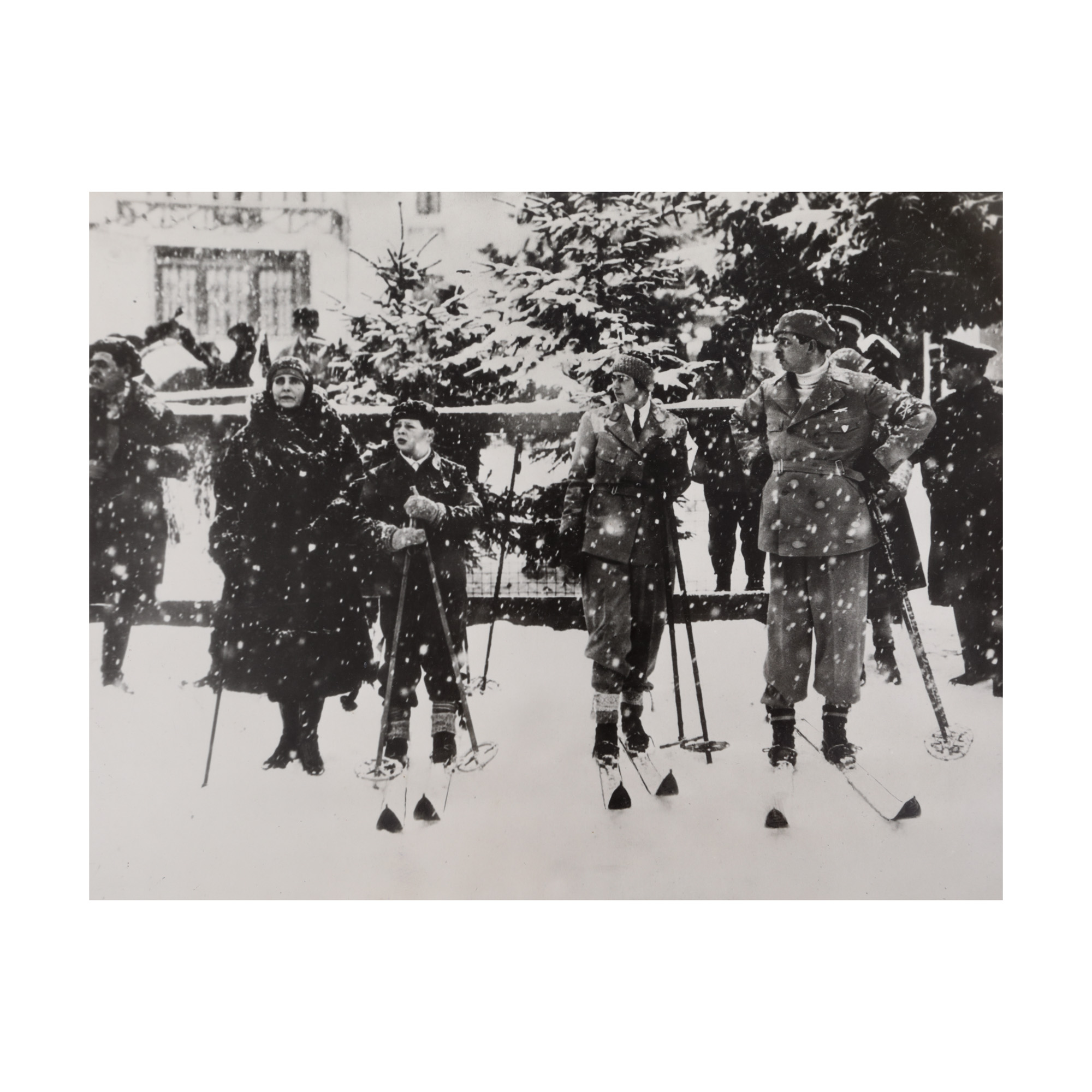 Press photograph depicting Queen Marie, King Carol II, Prince Michael I and Prince Nicolae, skiing, 1931