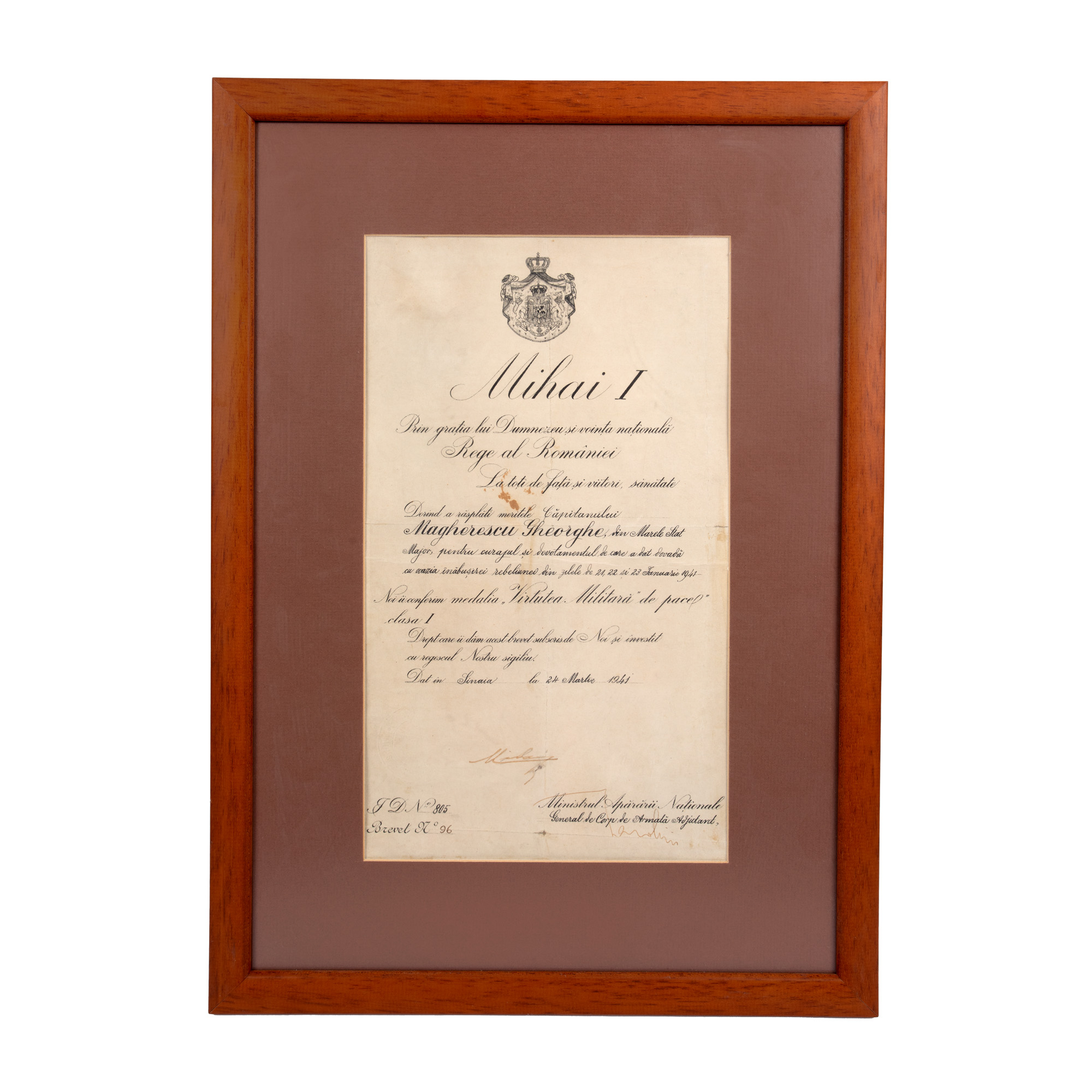 Set of decoration patent with "Military Virtue " granted to Captain Gheorghe Magherescu, Bucharest, March 24, 1941, with the handwritten signature of King Michael and General Iosif Iacobici, three photographs and a visit card of Captain Gheorghe Magherescu