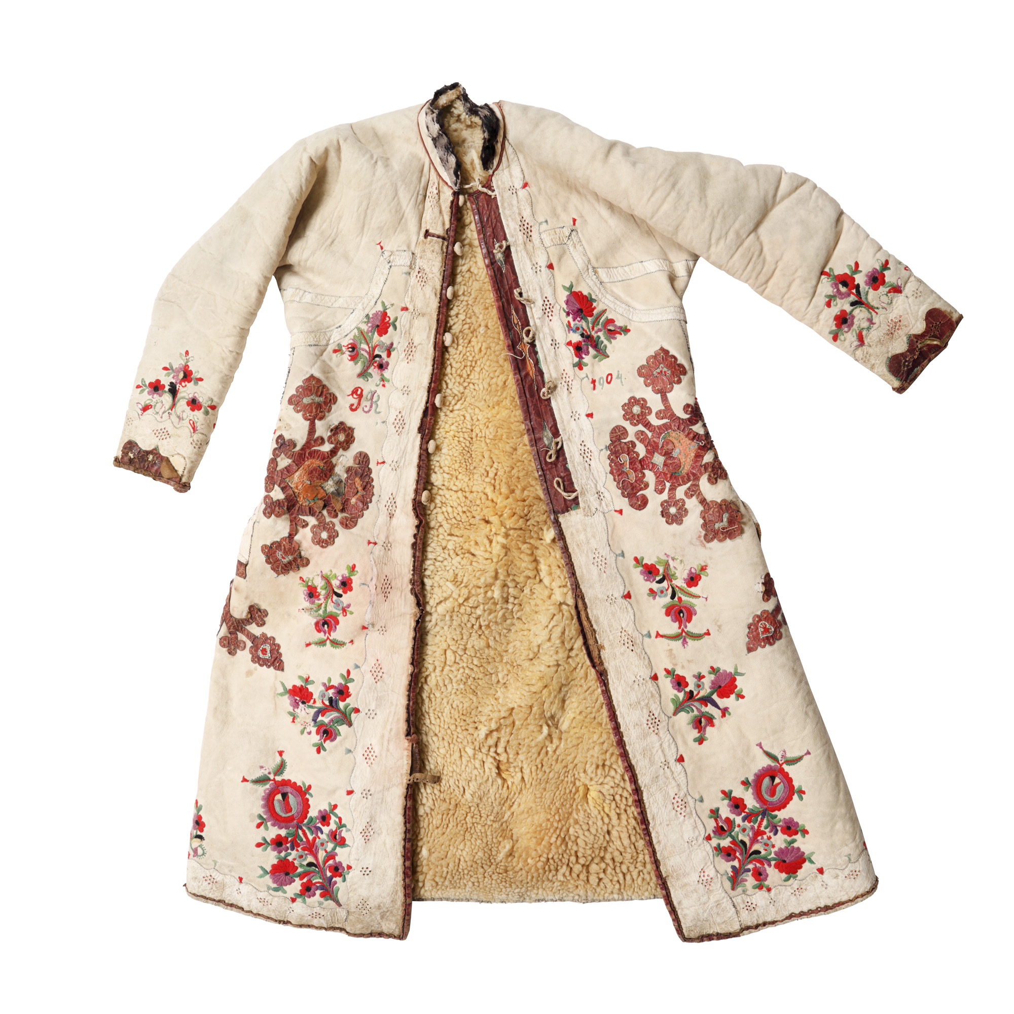 Cojoc săsesc din piele și blană, cu bogat decor floral, brodat cu inițialele proprietarului ”I.R.” și datat 1904, piesă rară, de colecție