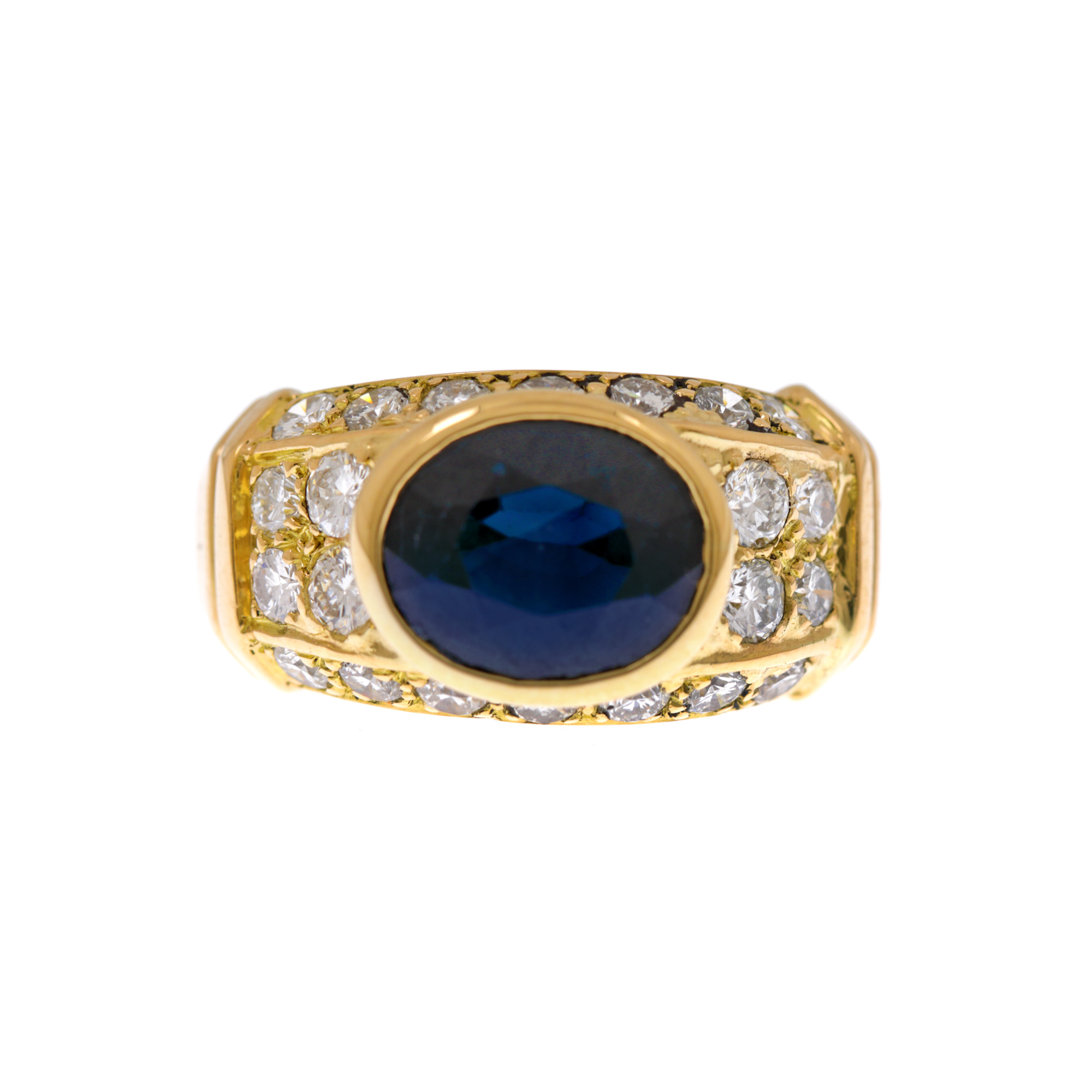 Gold ring, adorned with sapphire surrounded by diamonds