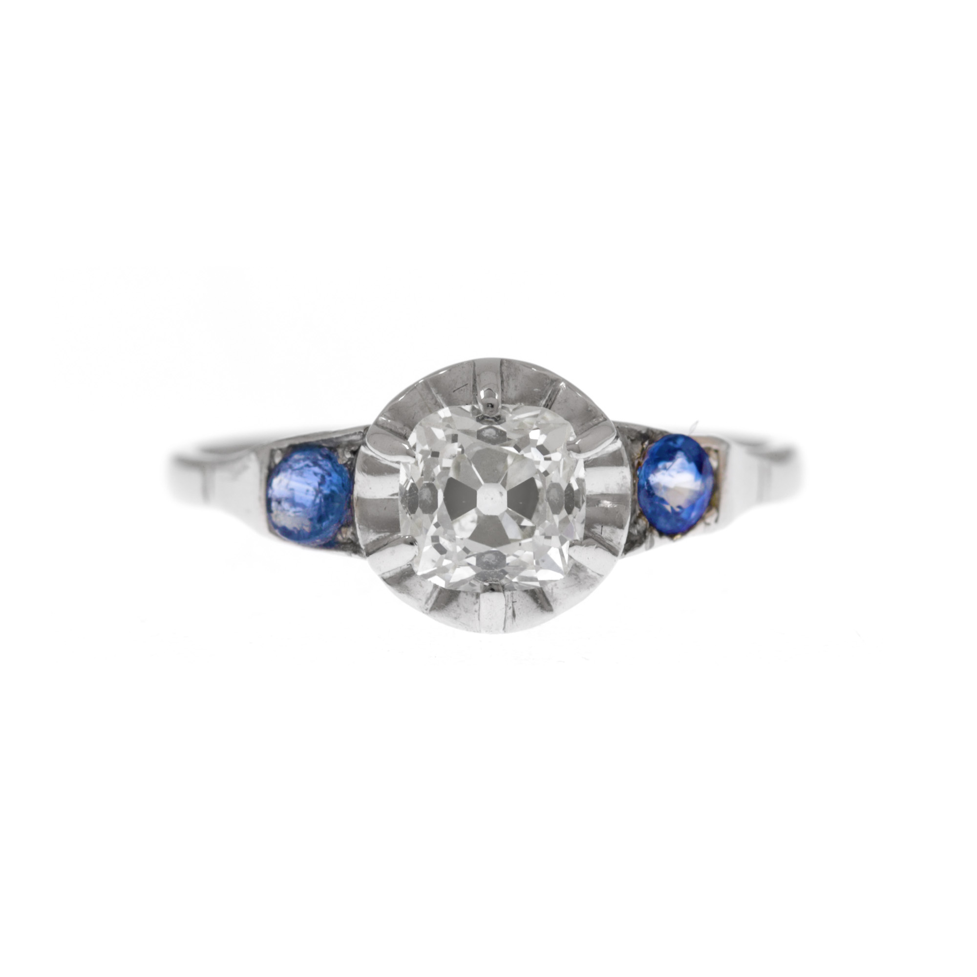 Platinum ring, adorned with diamonds and sapphires