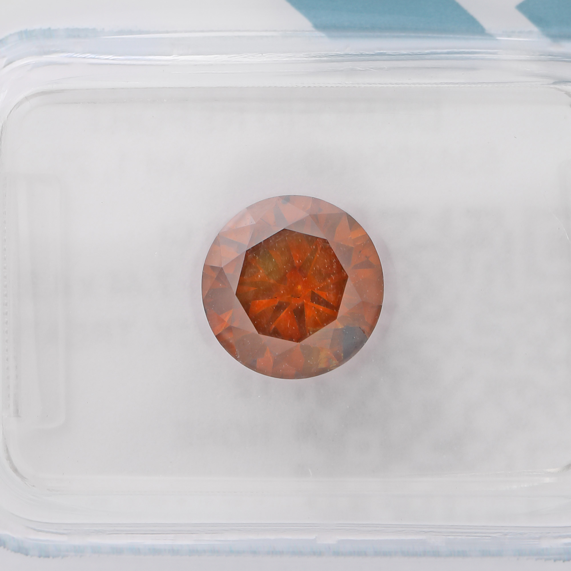 Diamant rotund briliant fancy yellow-orange, 1,60 ct., însoțit de certificat gemologic IGI