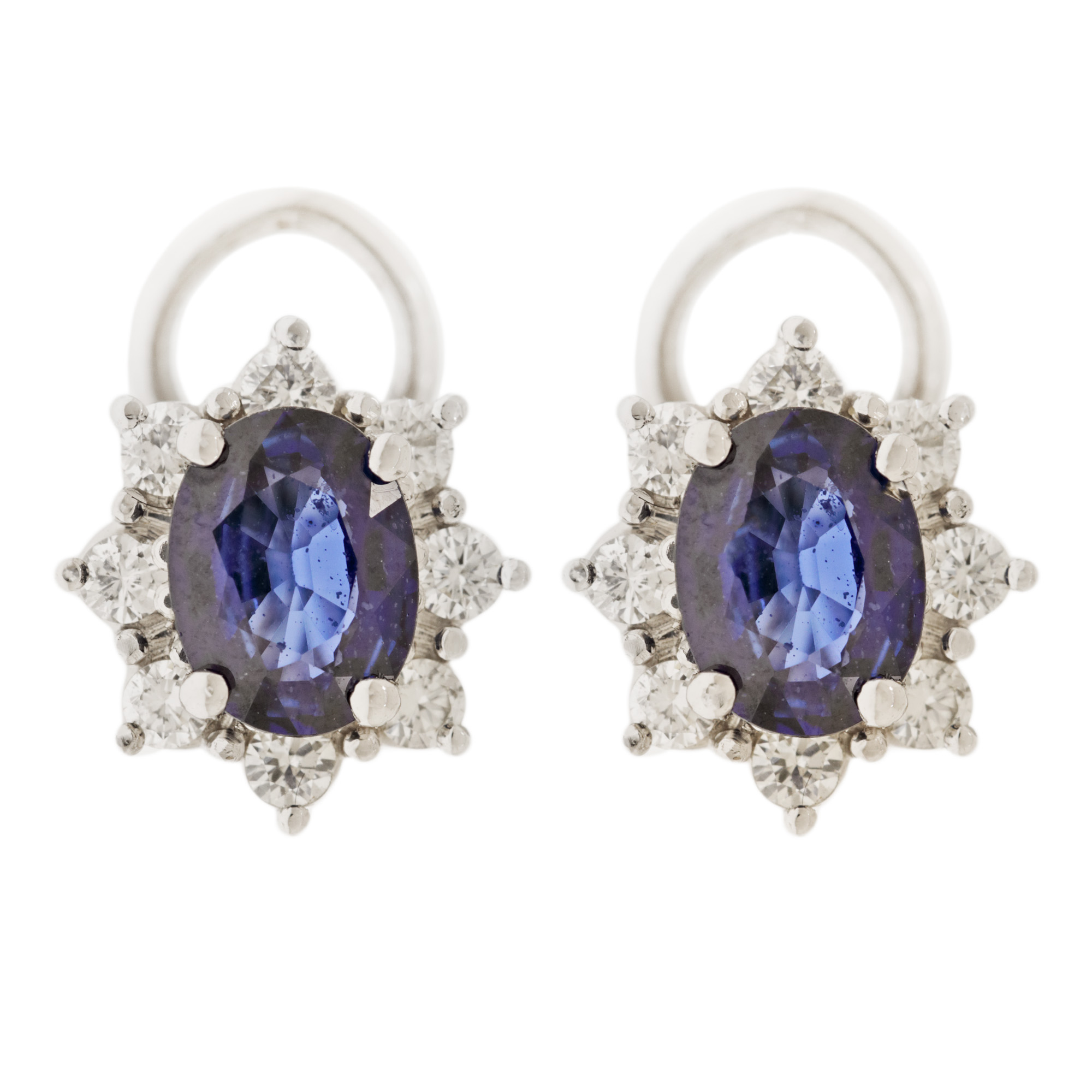Pair of white gold earrings, decorated with diamonds and sapphires