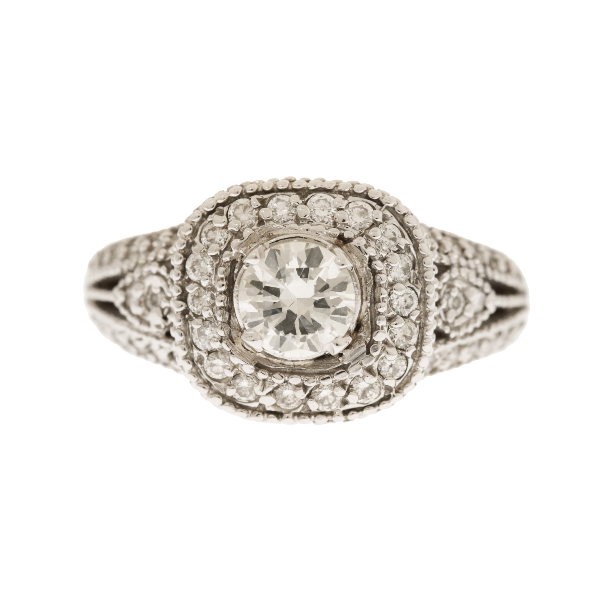 White gold ring, decorated with a central diamond, surrounded by diamonds