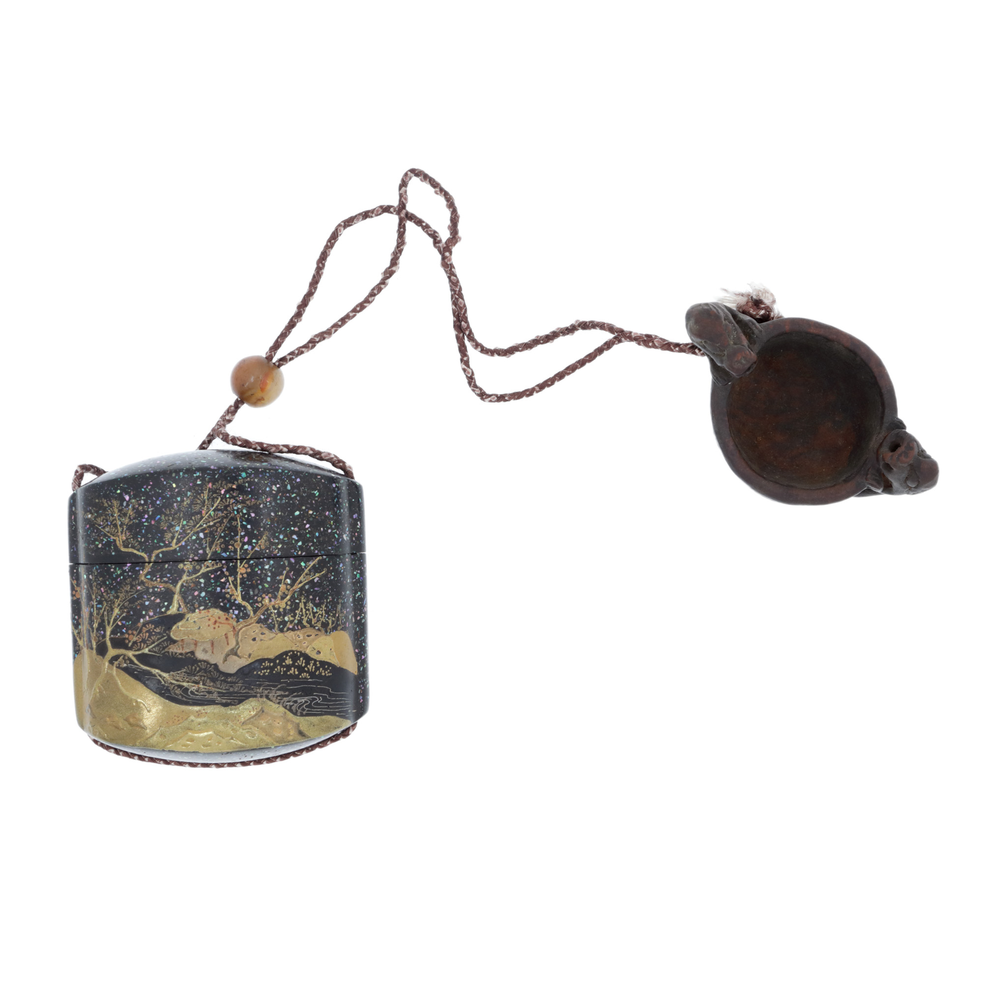 Lot consisting of lacquer inro, decorated in maki-e technique, with a spring landscape under the starry sky, ojime, netsuke made from exotic wood, depicting two platypuses sipping from a cup, Meiji period, Japan, end of the 19th century.