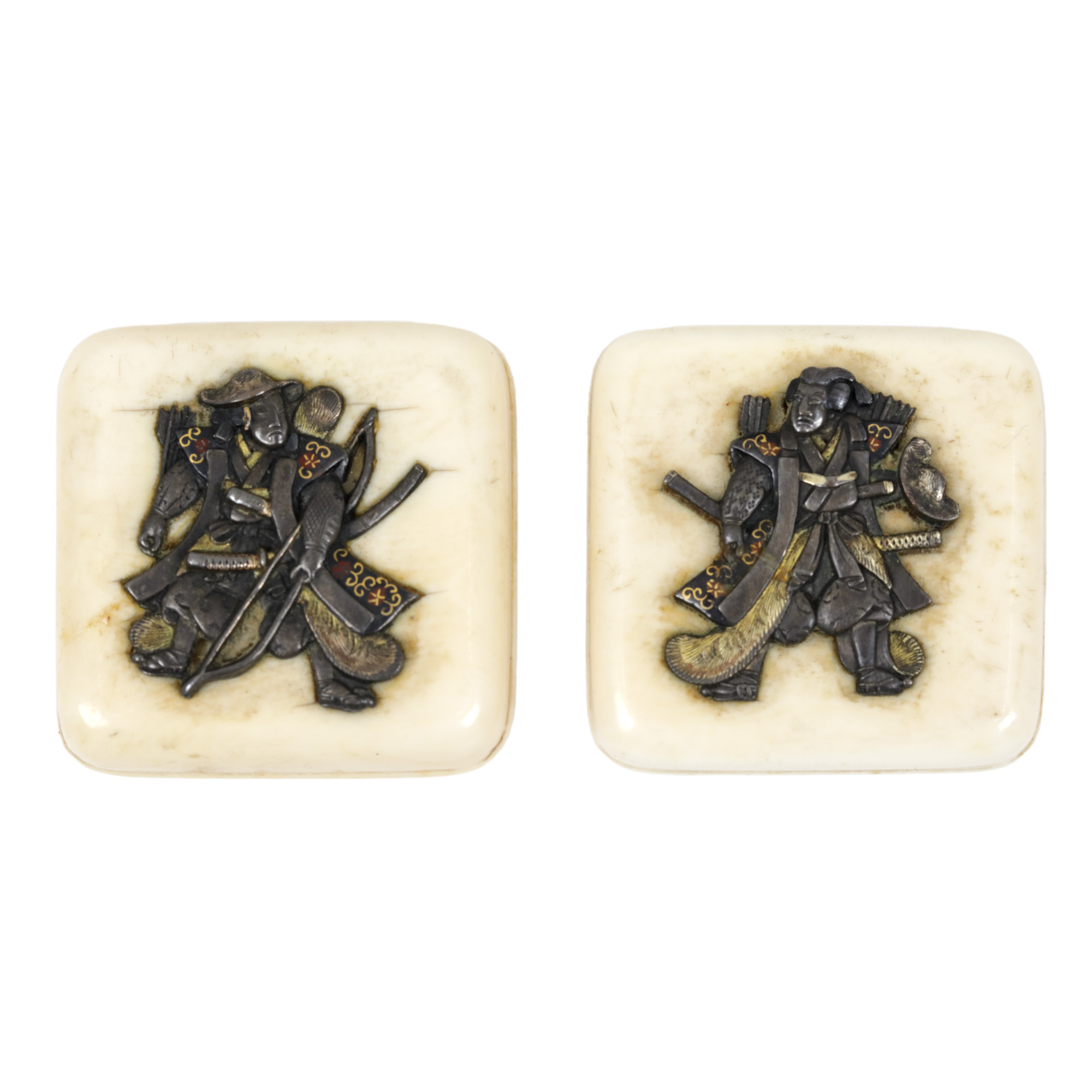 Pair of ivory cufflinks, decorated with gilded silver samurai, Meiji period, Japan, circa 1910.