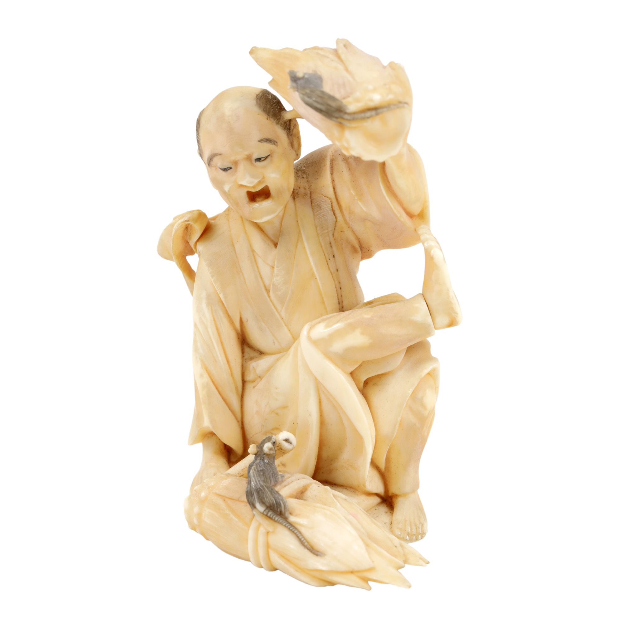 Ivory Okimono, illustrating a farmer and two mice (attacking his crop), Meiji period, Japan, early 20th century.