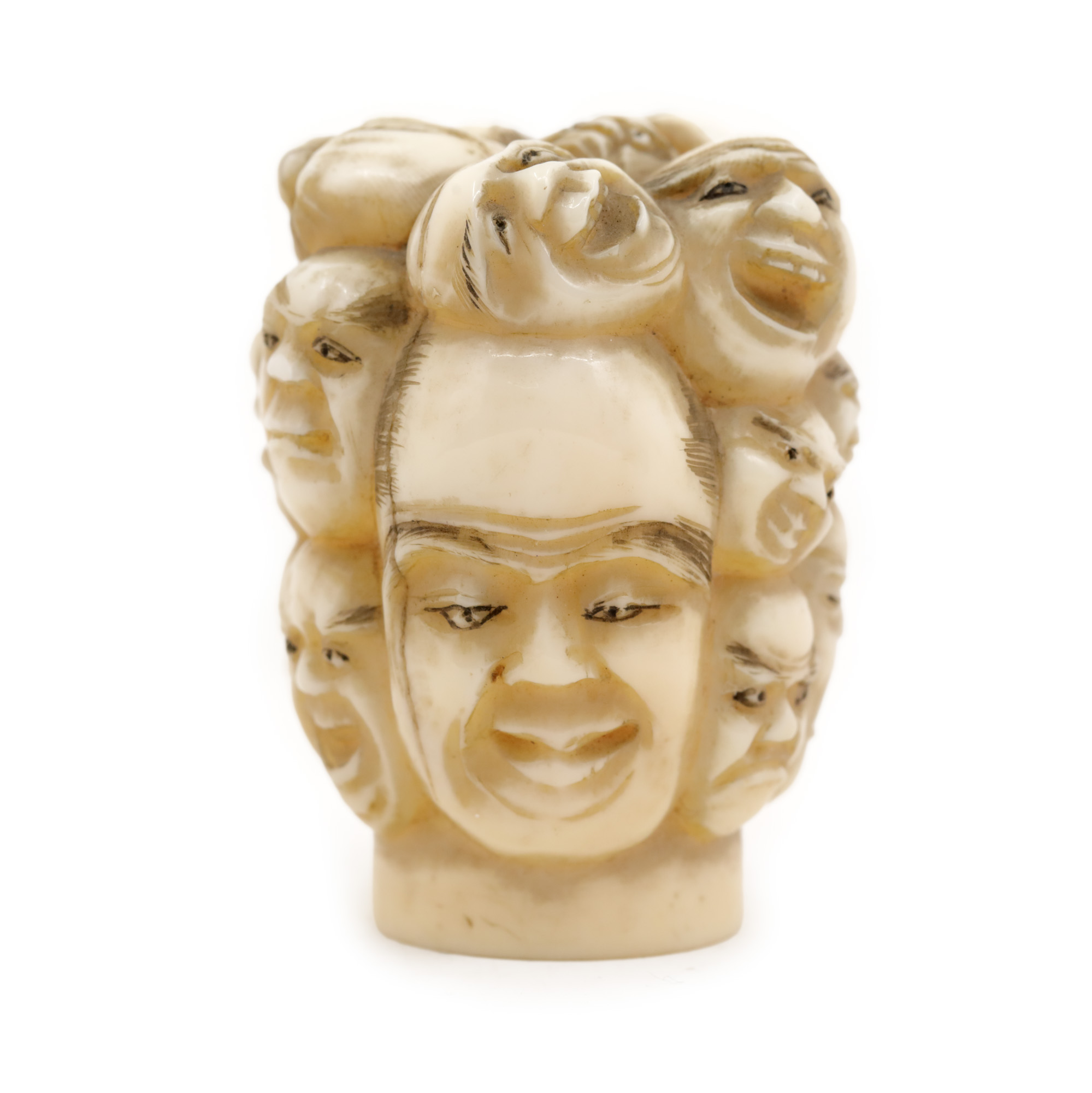 Okimono with 16 expression heads, Meiji period, Japan, early 20th century