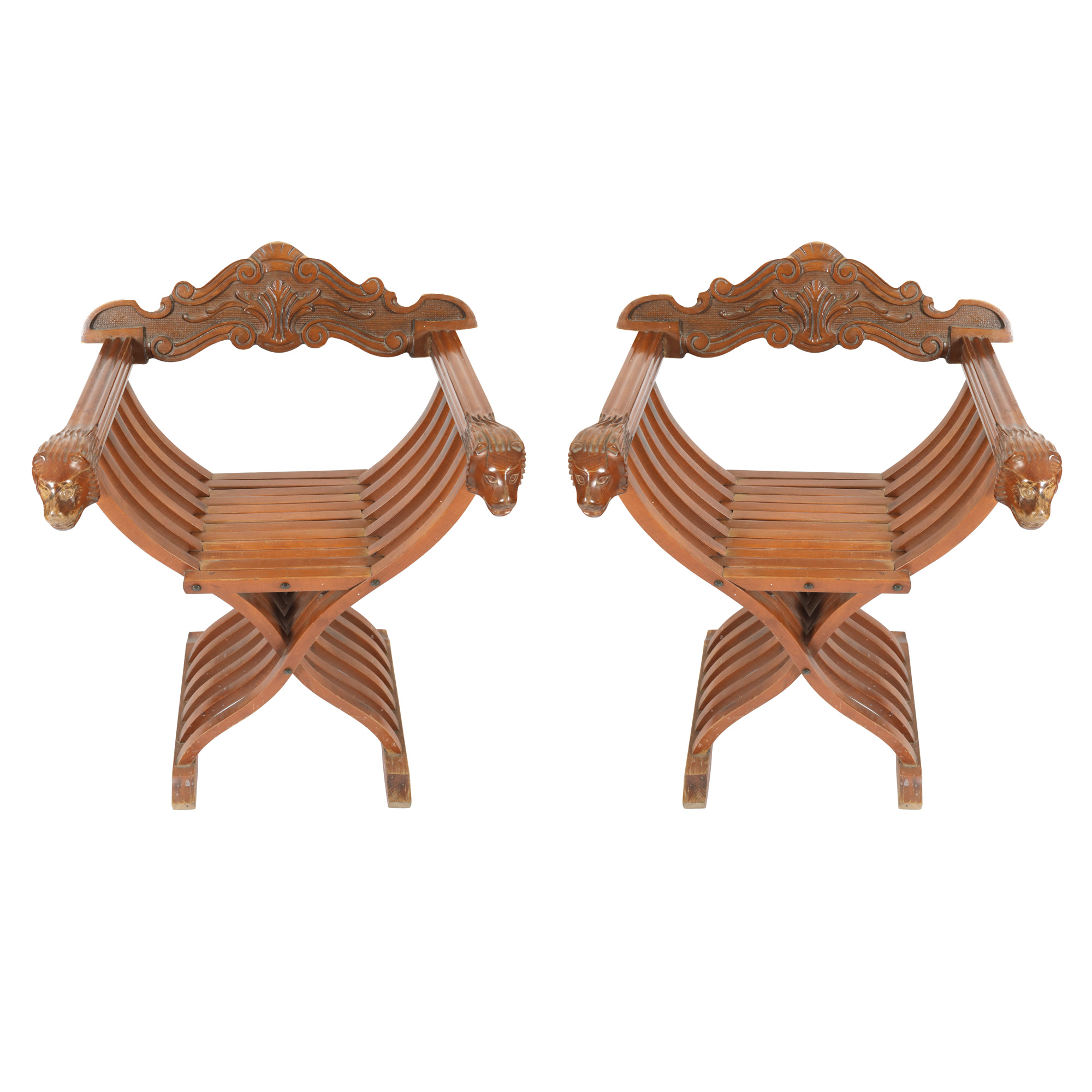 Pair of Savonarola armchairs in Neo-Renaissance style, decorated with heads of fantastic animals, cca. 1930