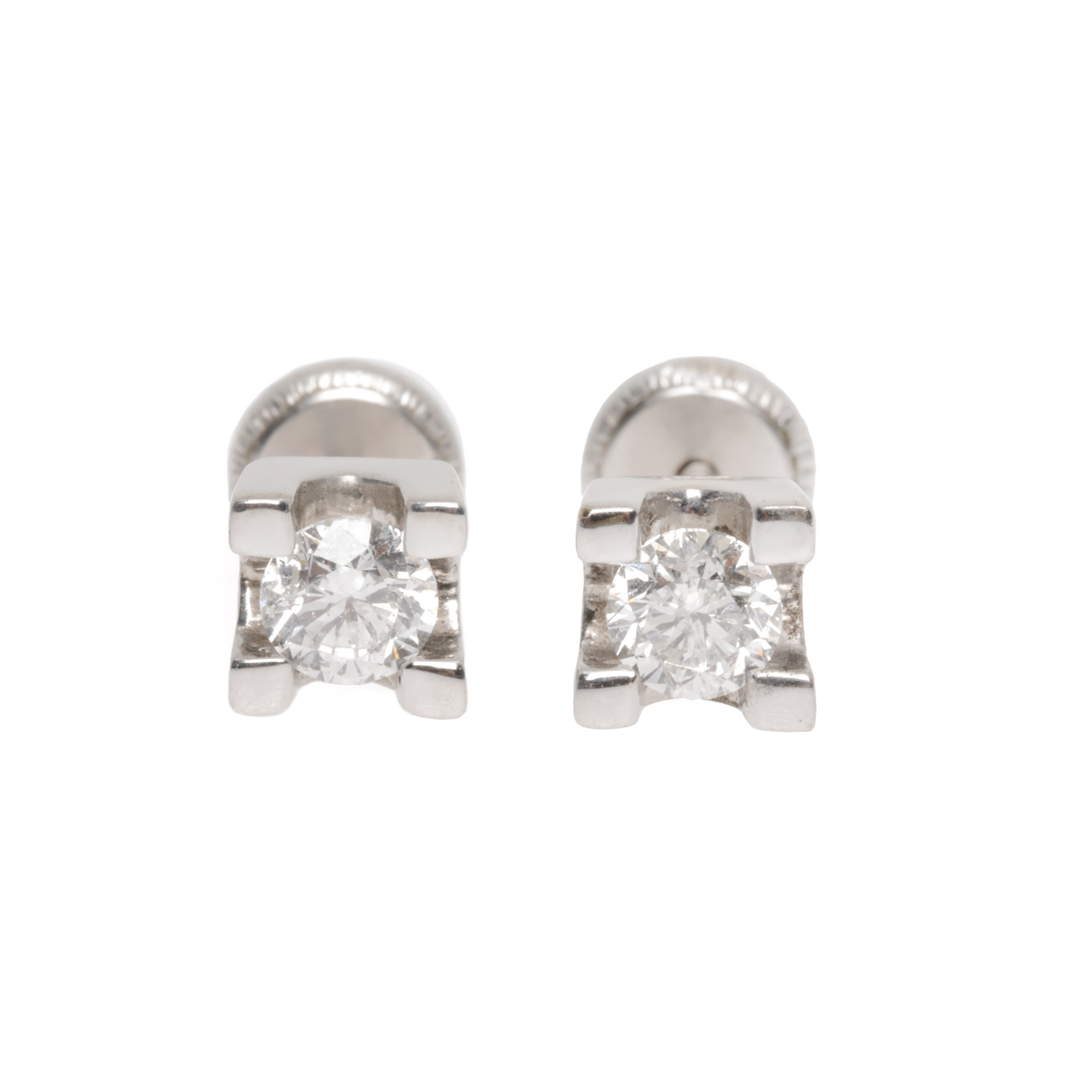 Pair of white gold earrings adorned with diamonds