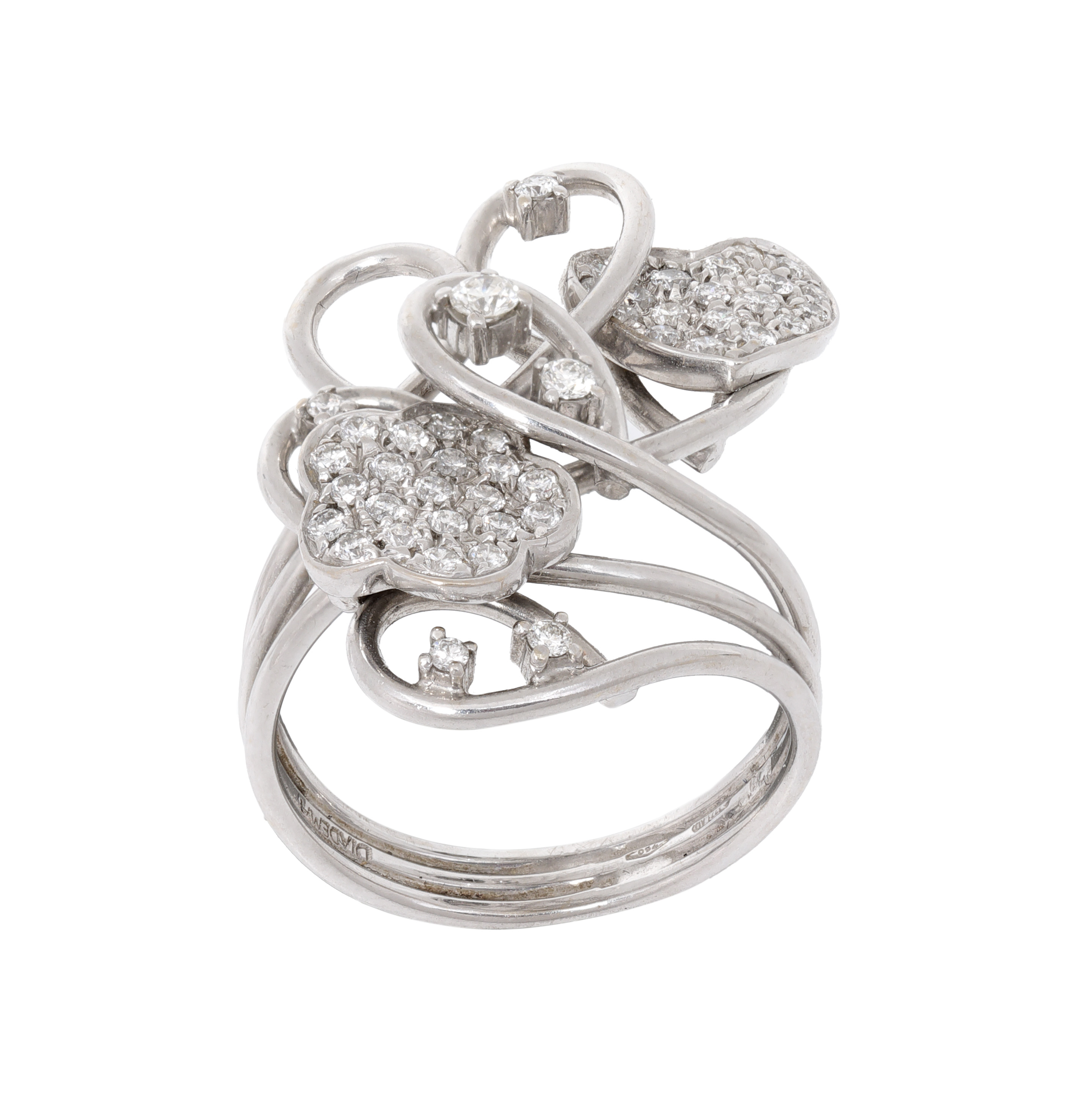 White gold ring, decorated with diamonds arranged in the shape of a heart and flower