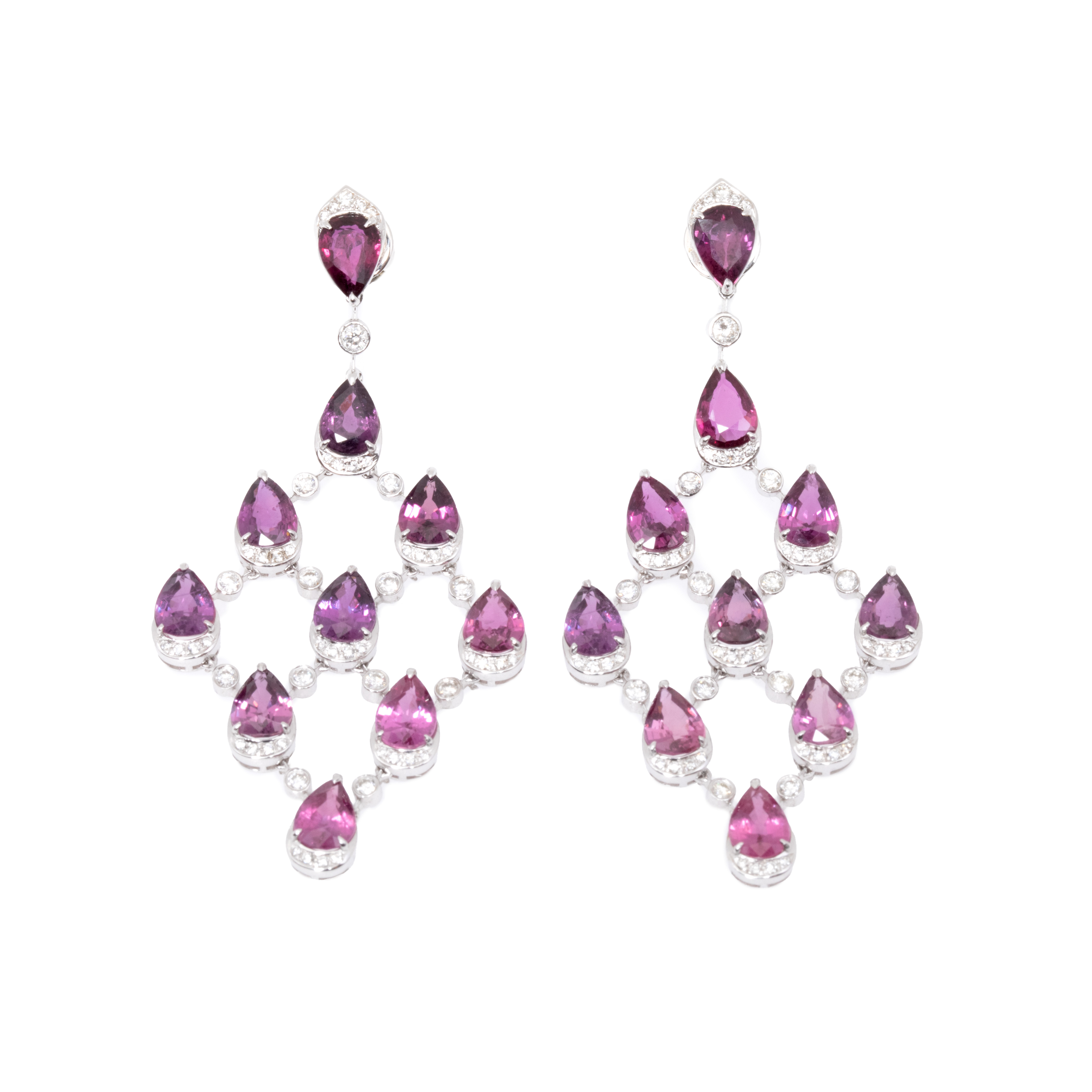 Pair of white gold earrings, decorated with diamonds and rubelites