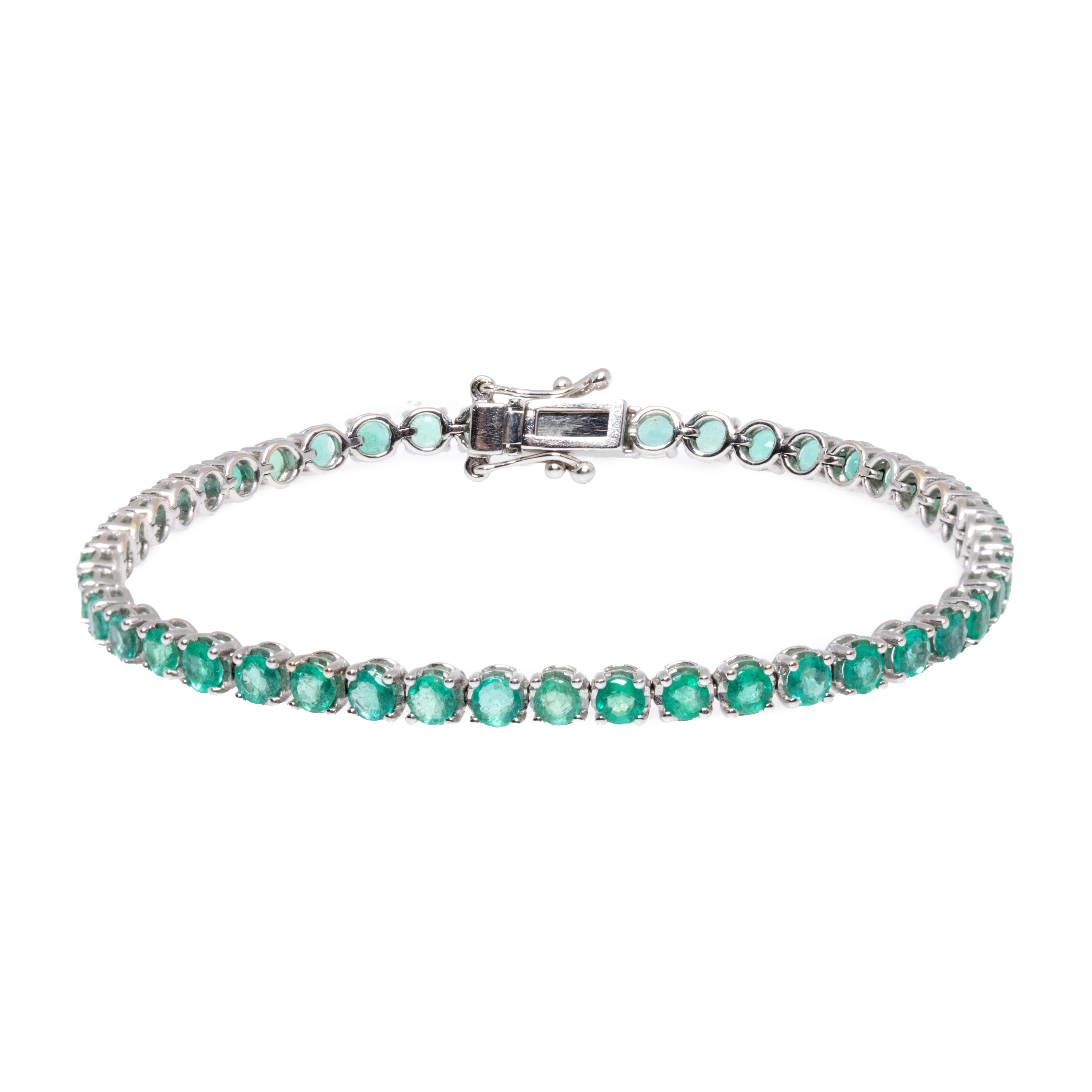 White gold bracelet, decorated with emeralds
