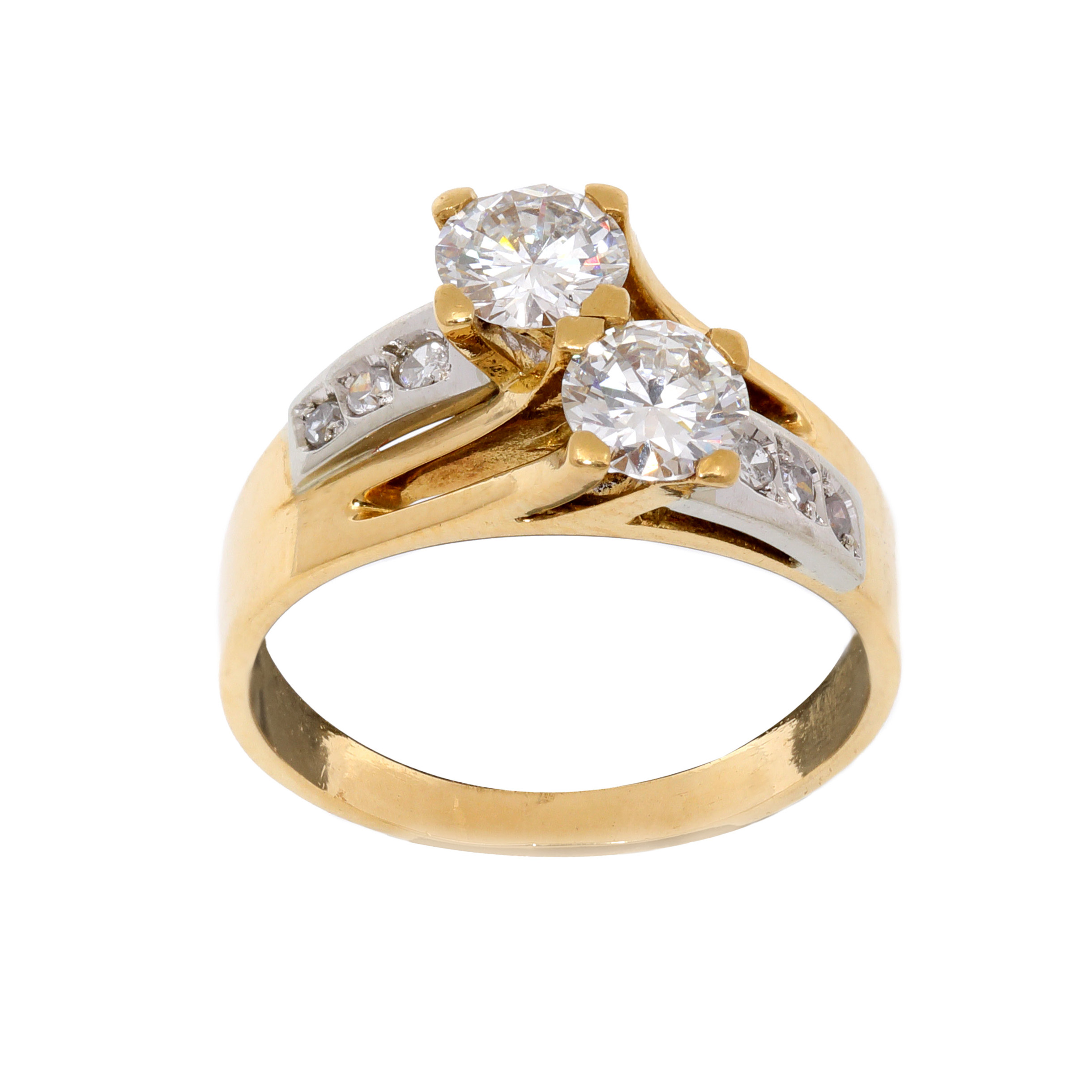 Two-tone gold ring, decorated with two central diamonds, surrounded by diamonds