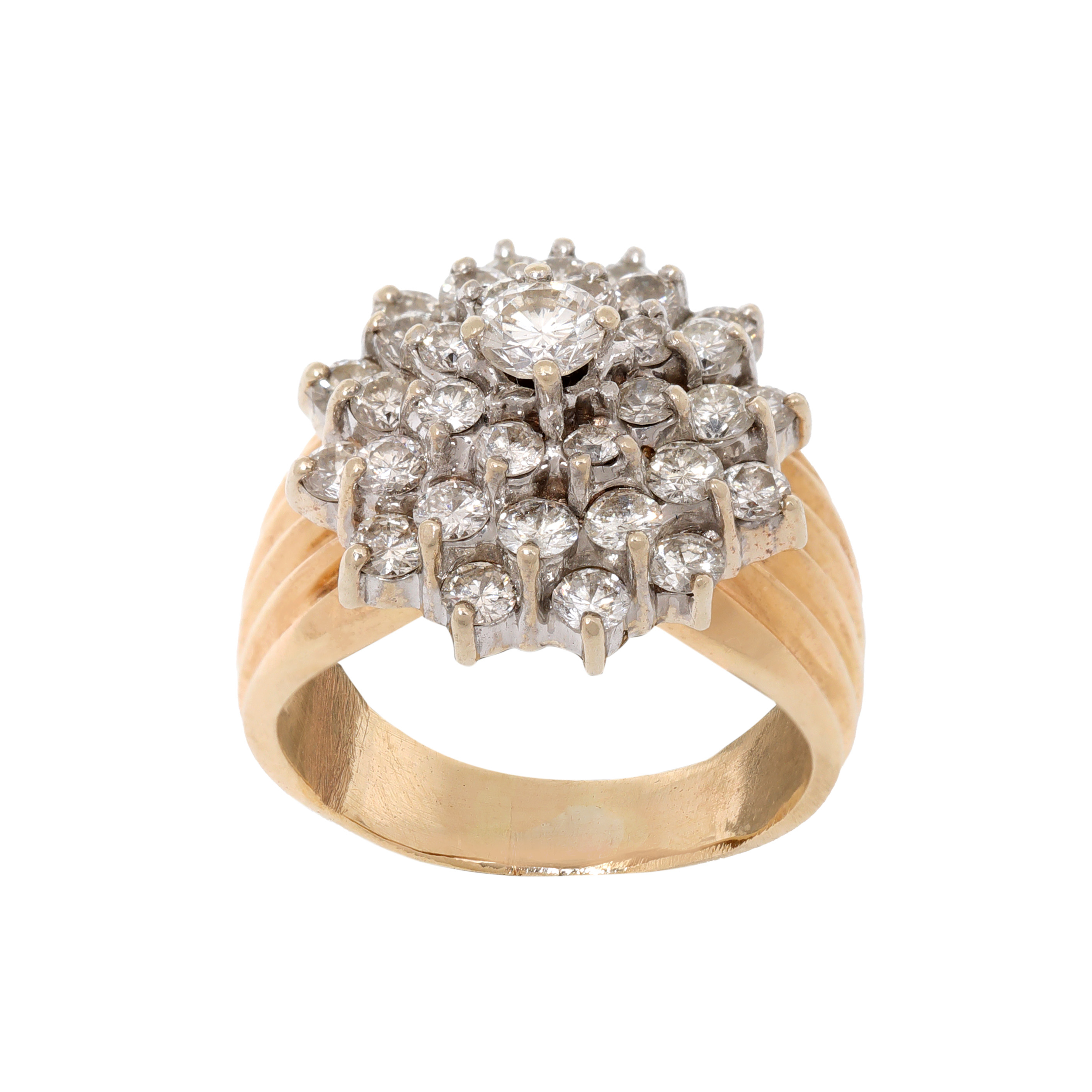 Massive bicolor gold ring, decorated with a multitude of diamonds