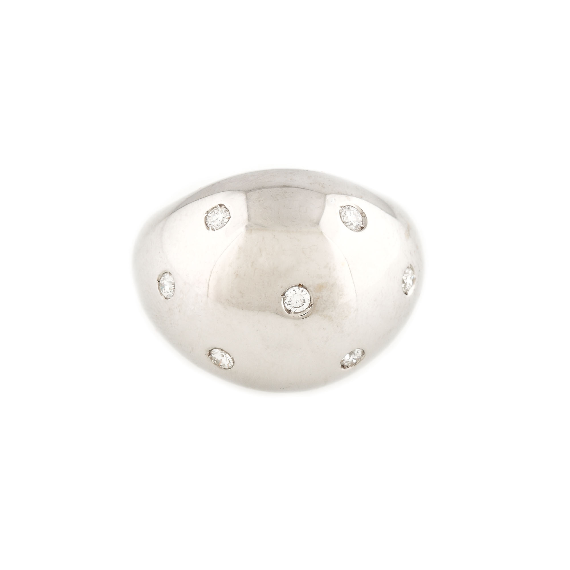 Interesting white gold cocktail ring, sprinkled with diamonds