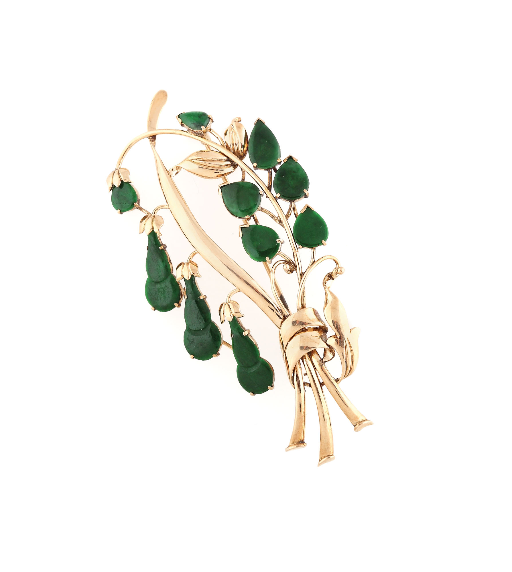 Gold brooch in the shape of a branch with jadeite leaves