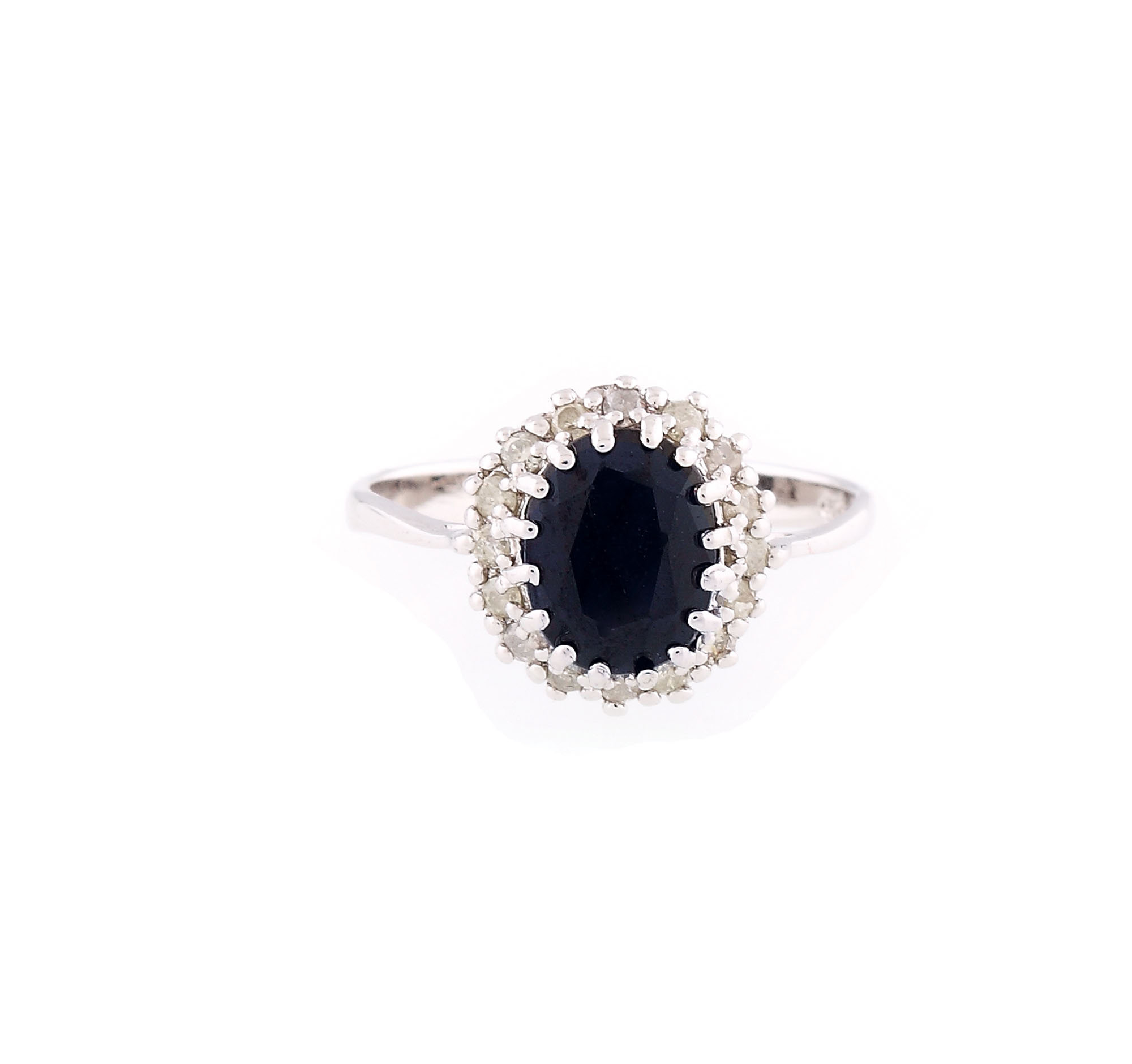 Silver ring, decorated with sapphire entoured by brilliants