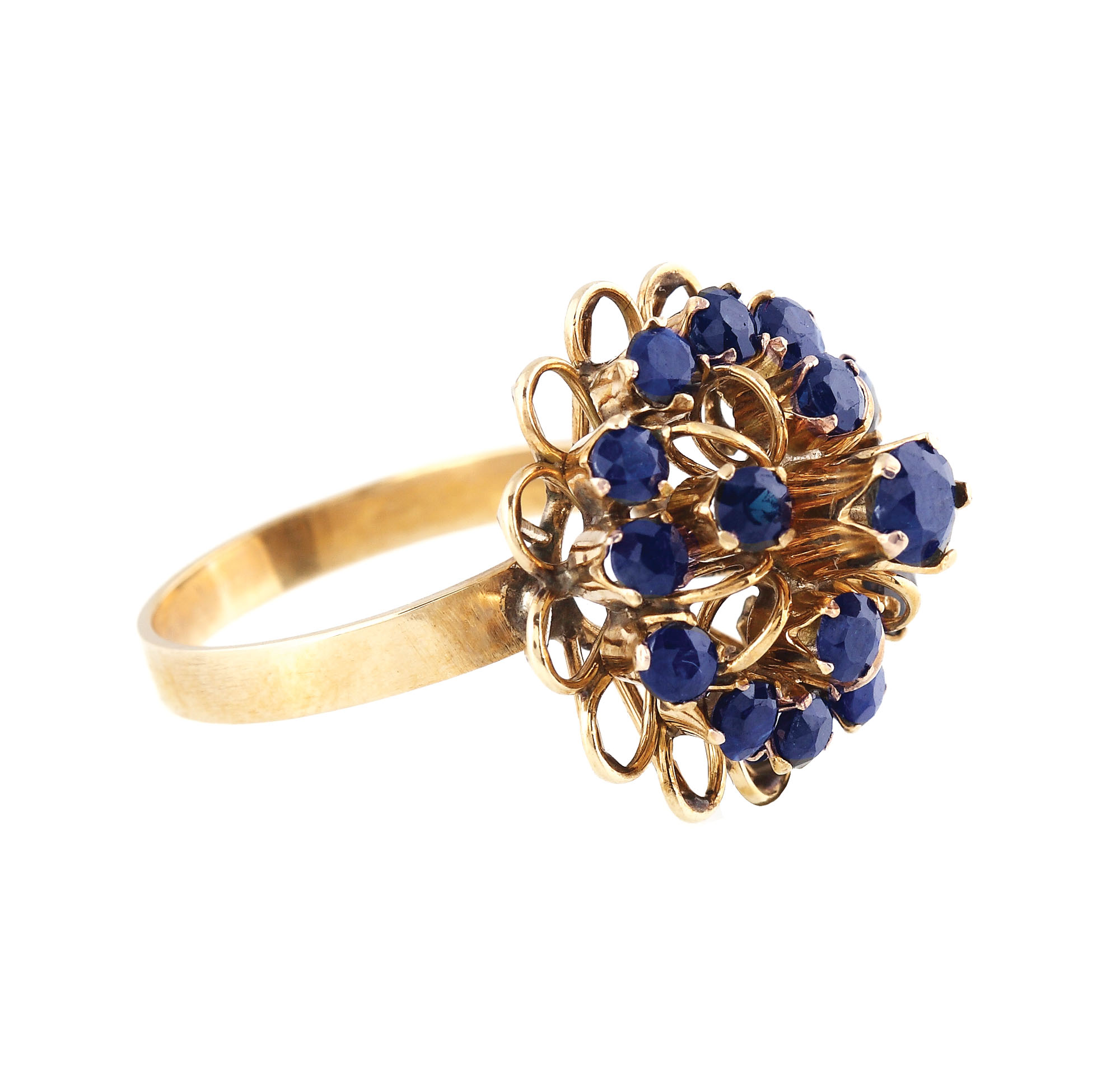 Gold ring ornate with sapphire crown