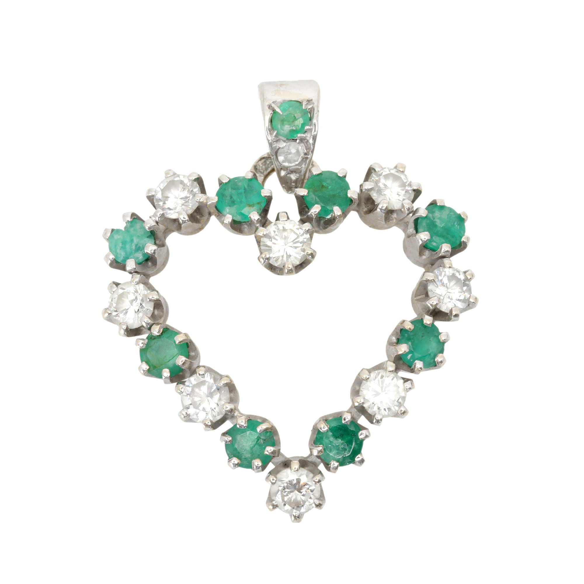White gold pendant in the shape of a heart, decorated with diamonds and emeralds
