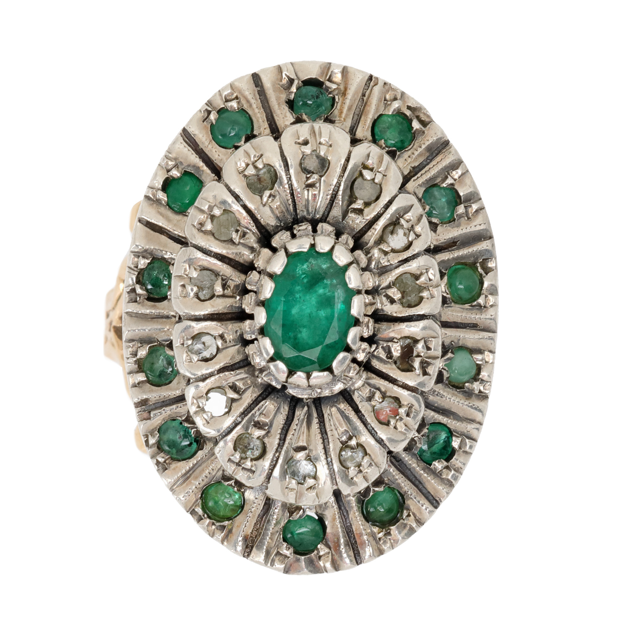 Ring made of gold and silver, decorated with diamonds and emeralds