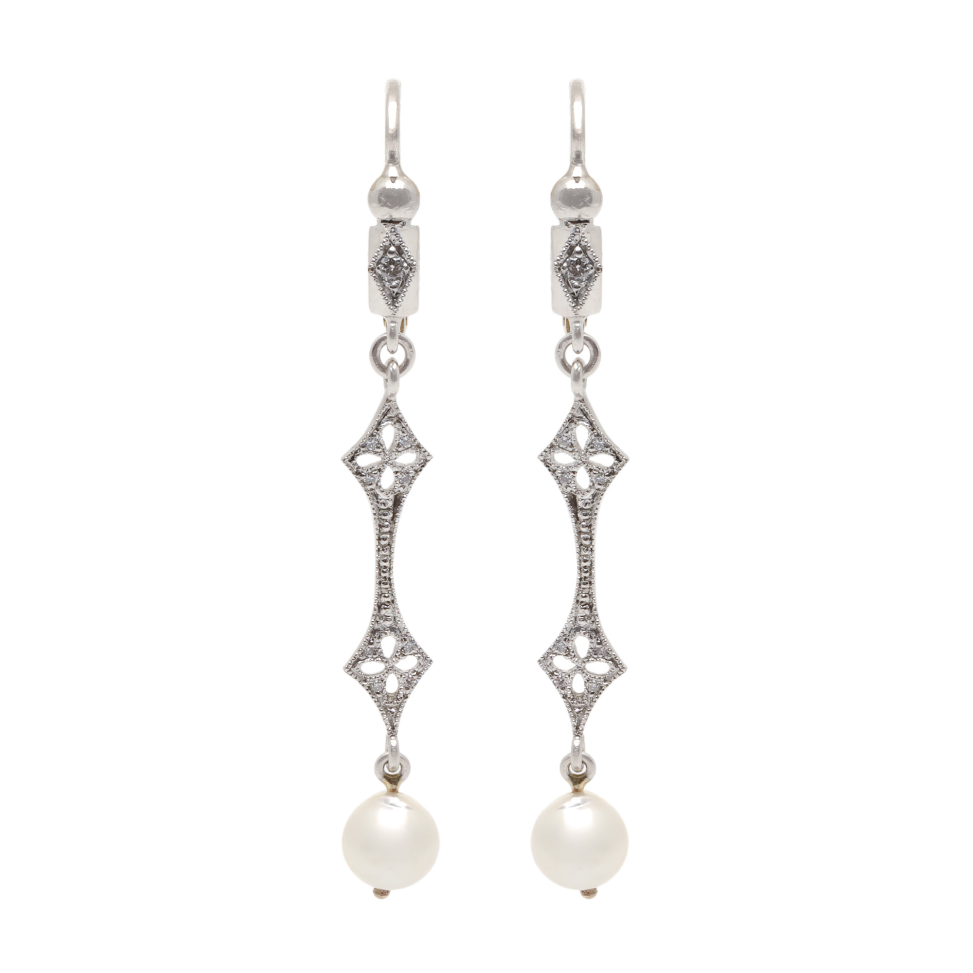 Pair of Art Deco earrings, made of gold and platinum, decorated with pearls and diamonds, design by Cathy Waterman
