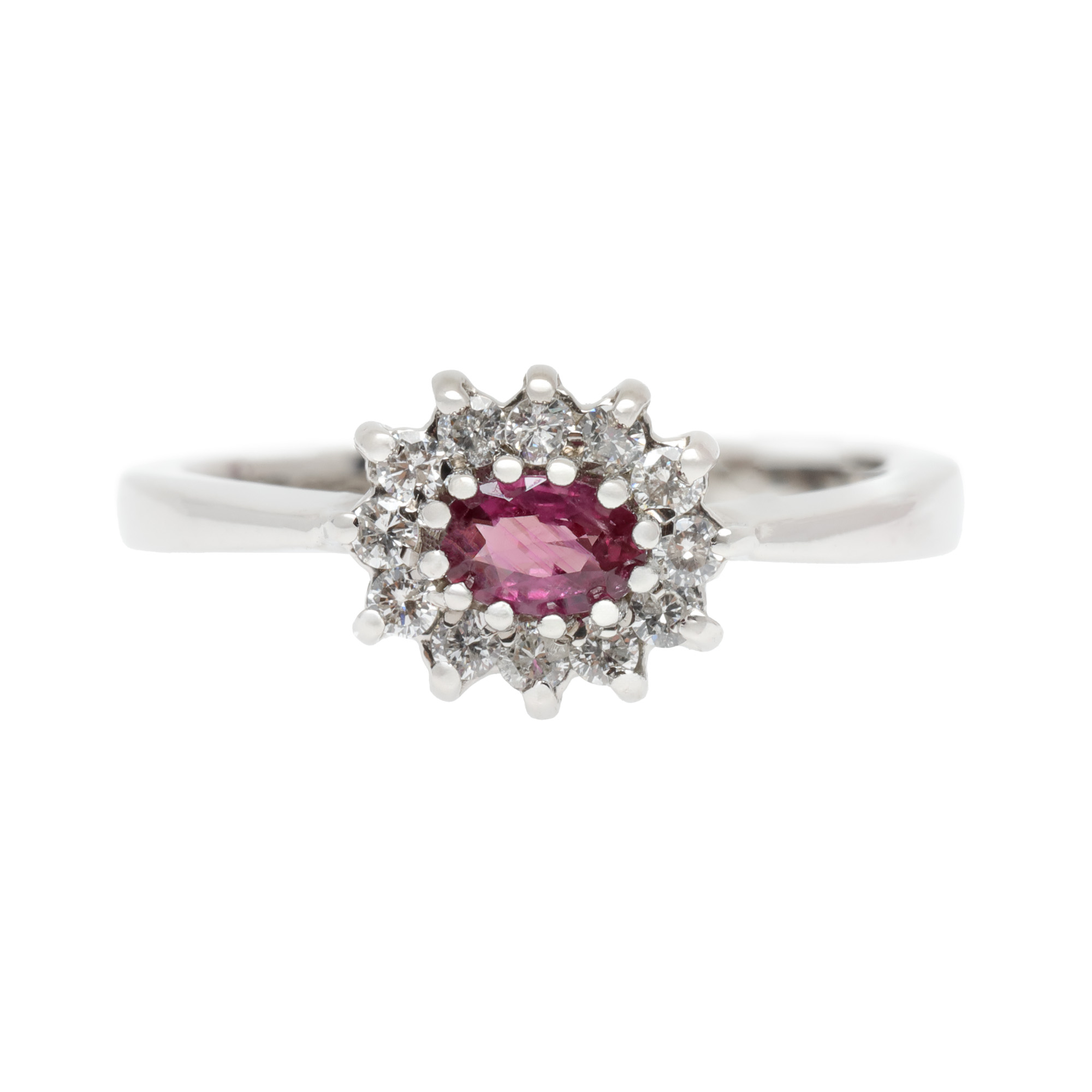 White gold ring, centrally decorated with ruby, surrounded by diamonds