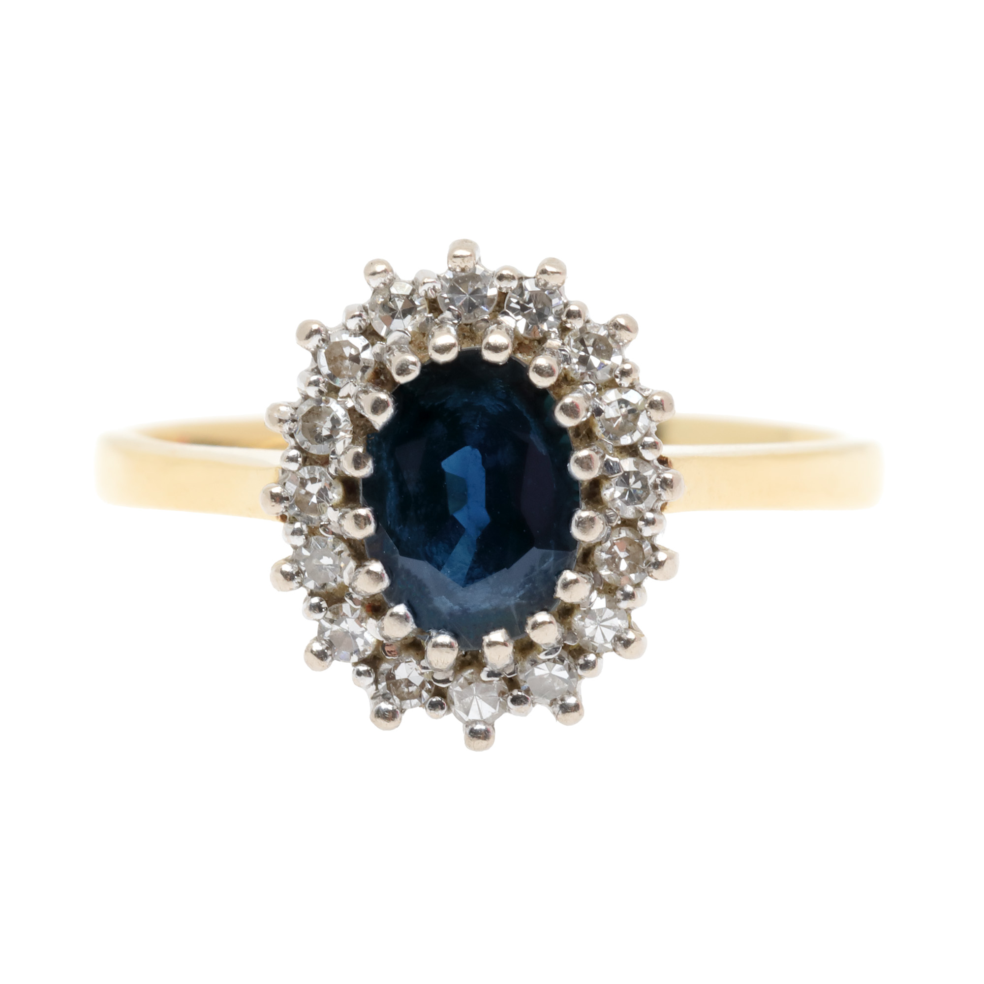 Inel din aur bicolor, decorat cu safir central, anturat de diamante