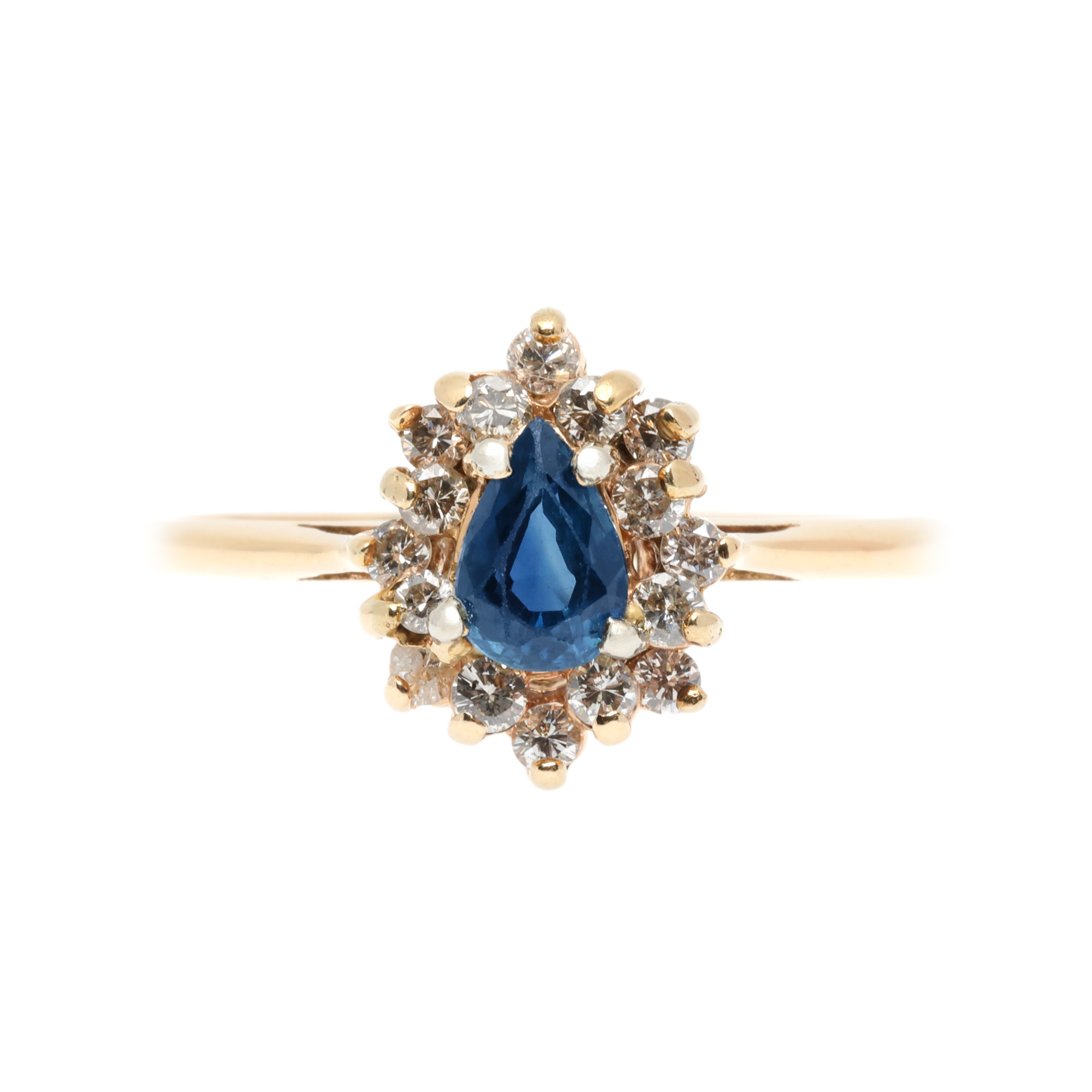 Gold ring, decorated with sapphire, surrounded by diamonds