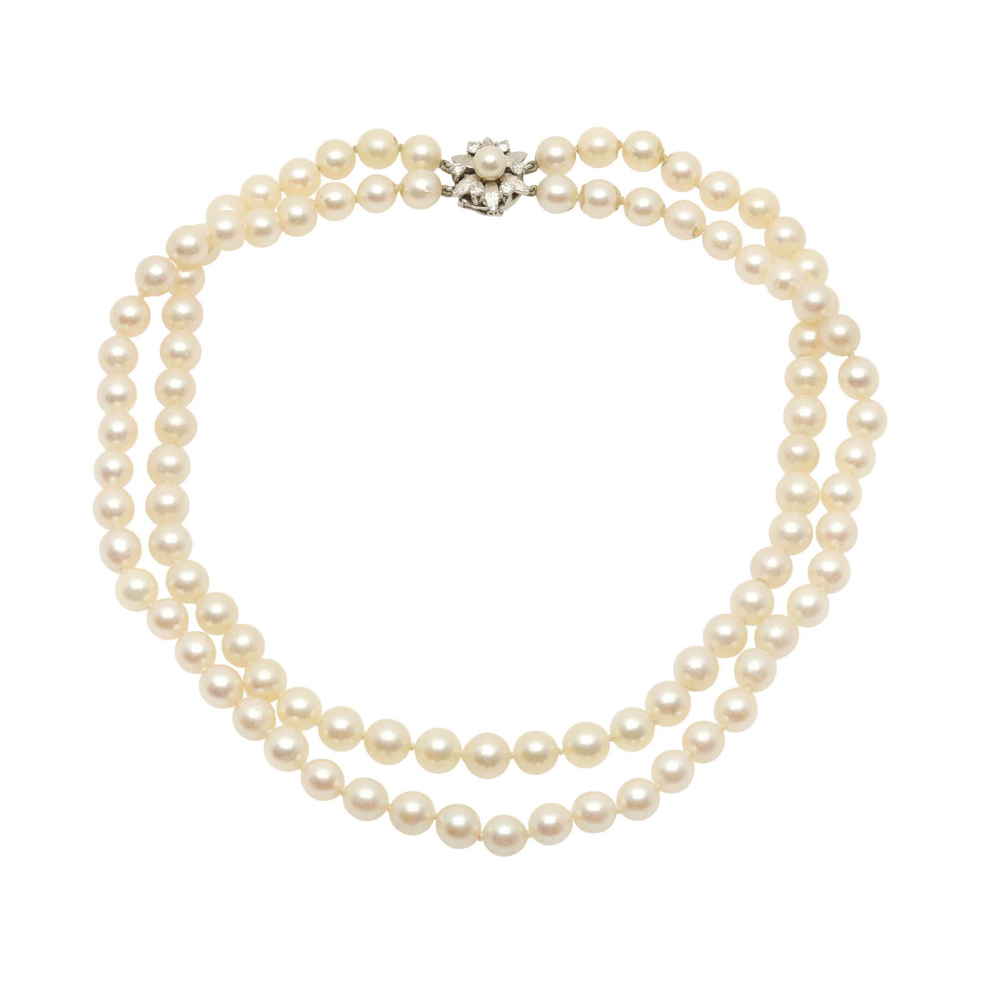 Pearl necklace, with white gold clasp, in the shape of a flower, decorated with pearl and diamonds