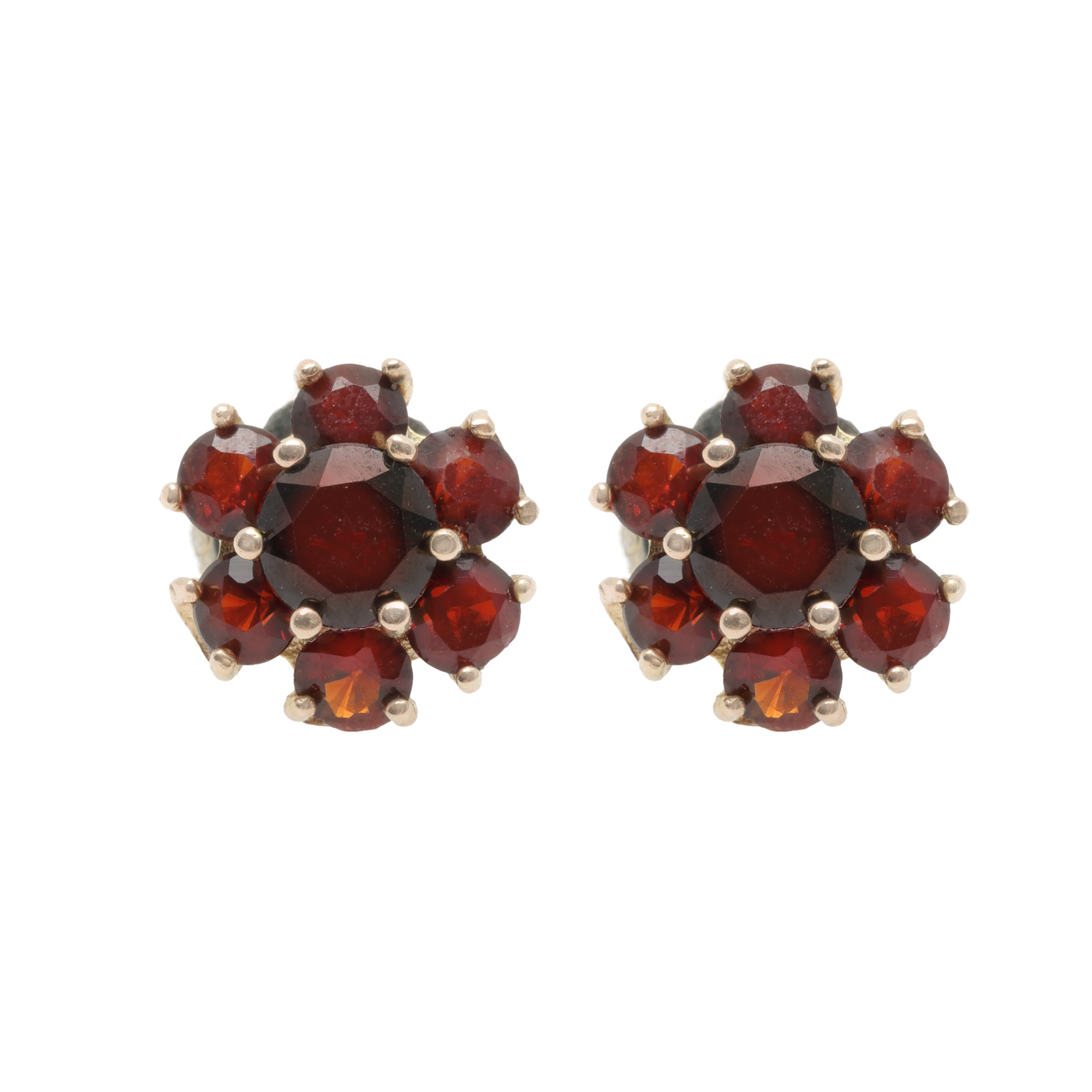 Pair of gold earrings decorated with garnets