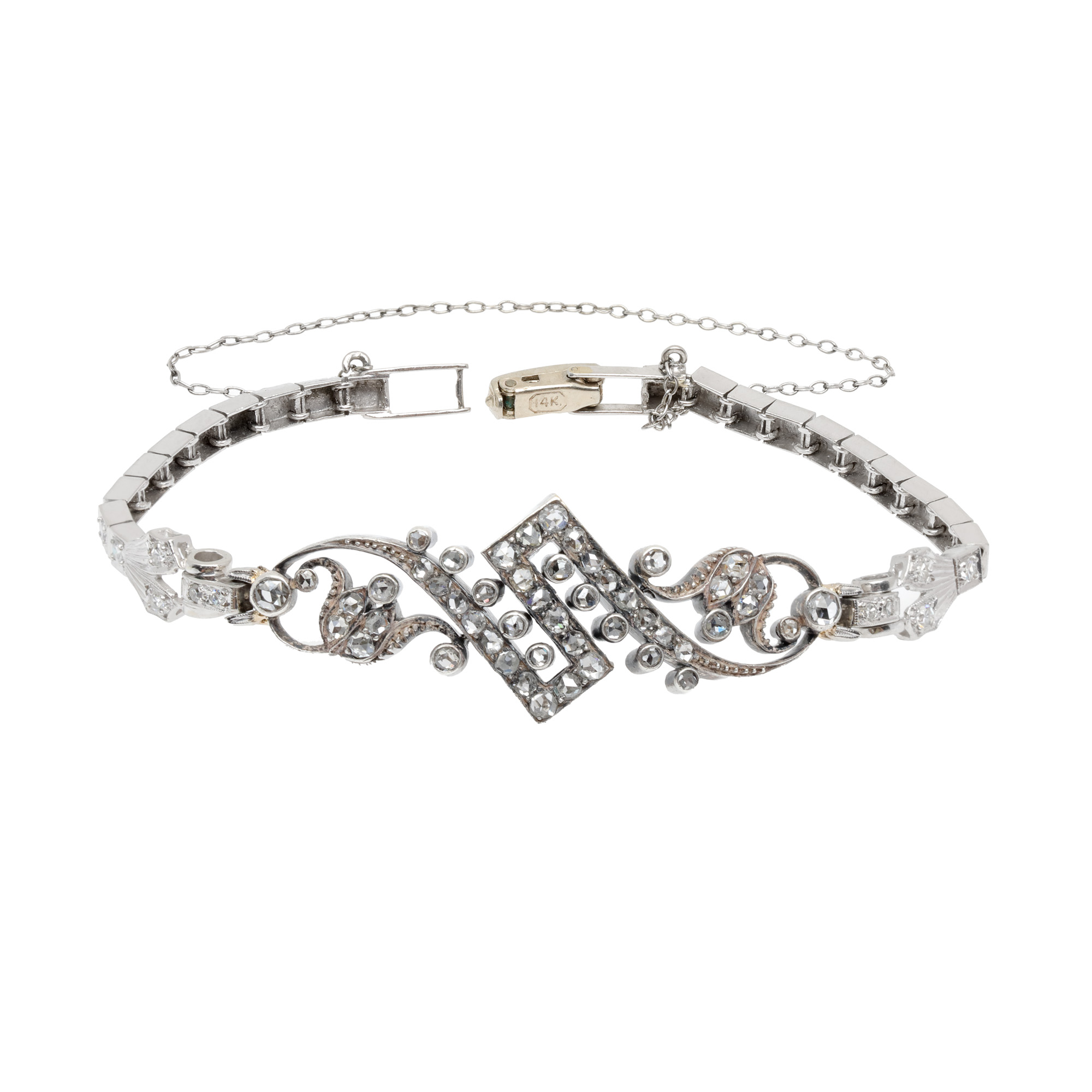 Bicolor gold and silver bracelet, decorated with diamonds, cca. 1930
