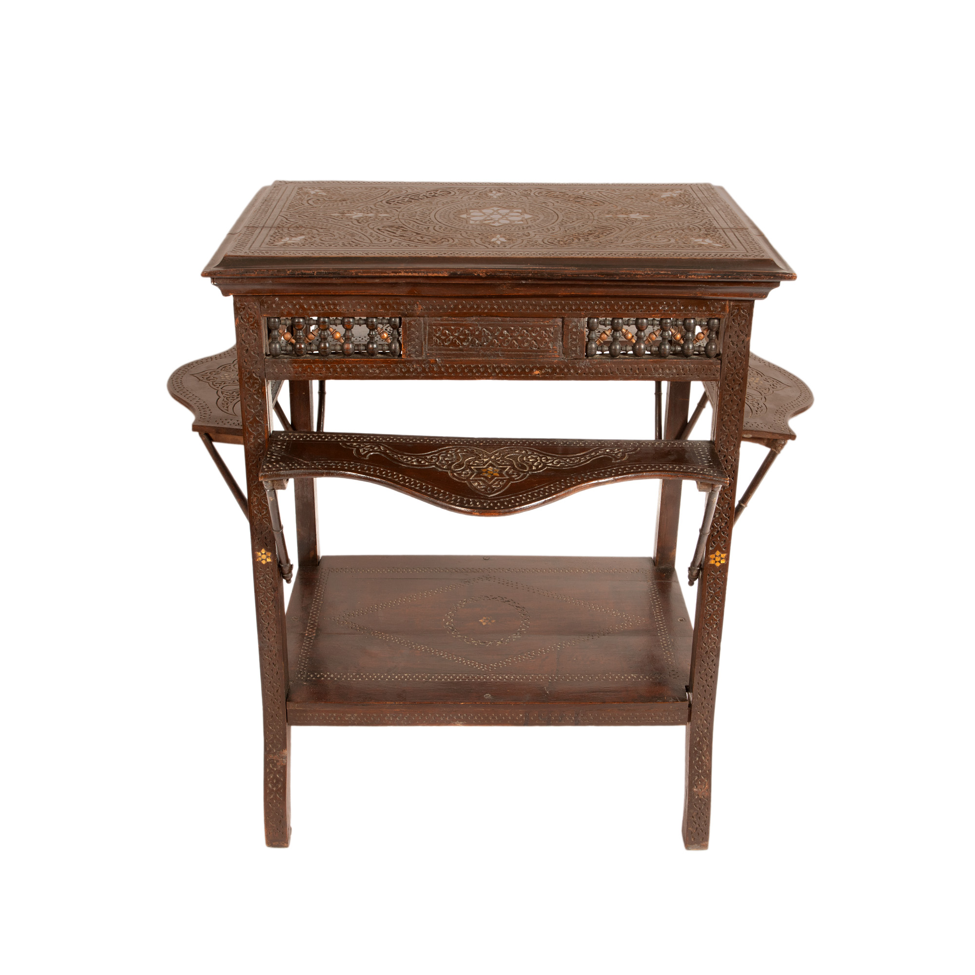 Rocking footstool with floral upholstery