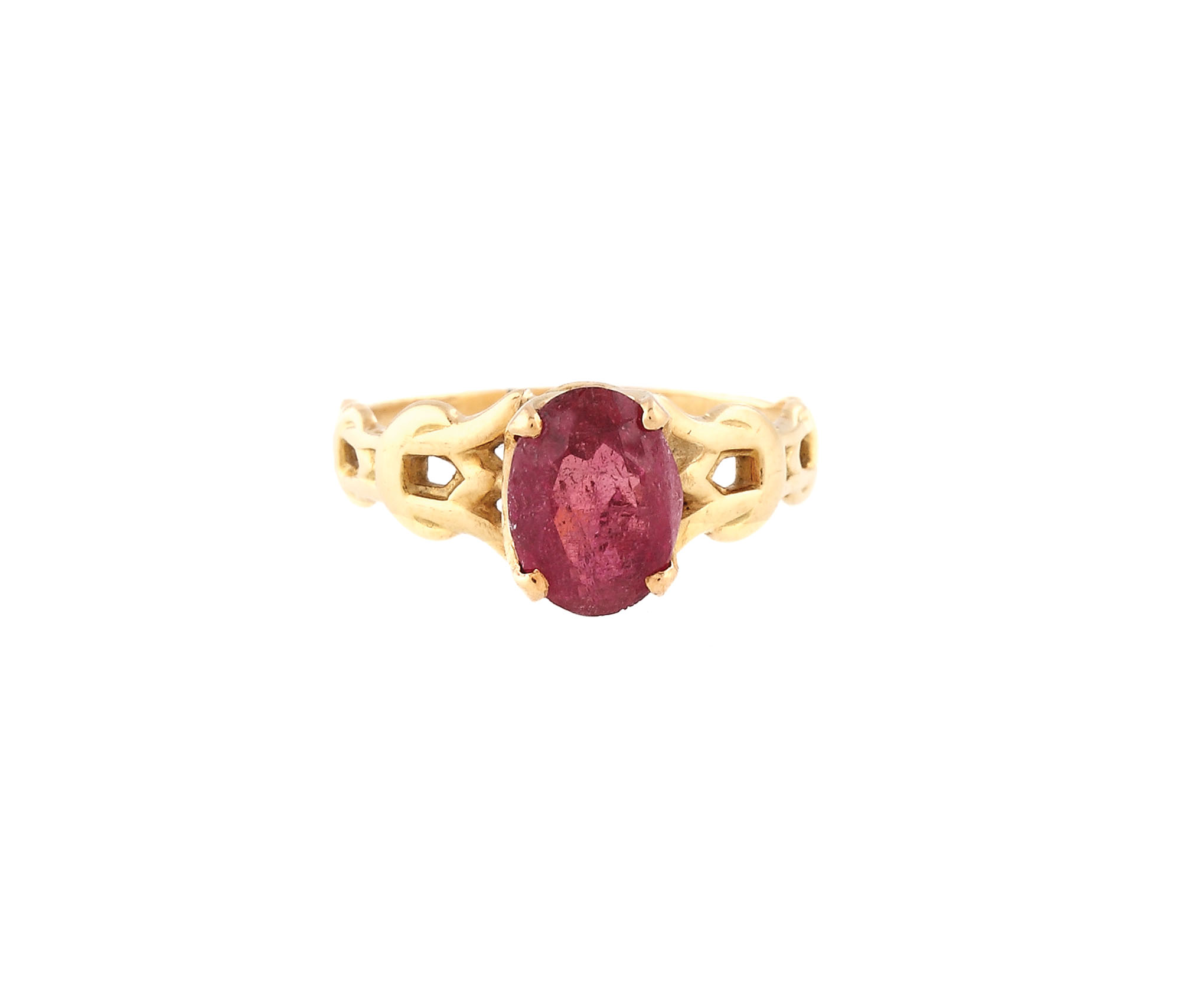 Gold ring ornate with a red tourmaline