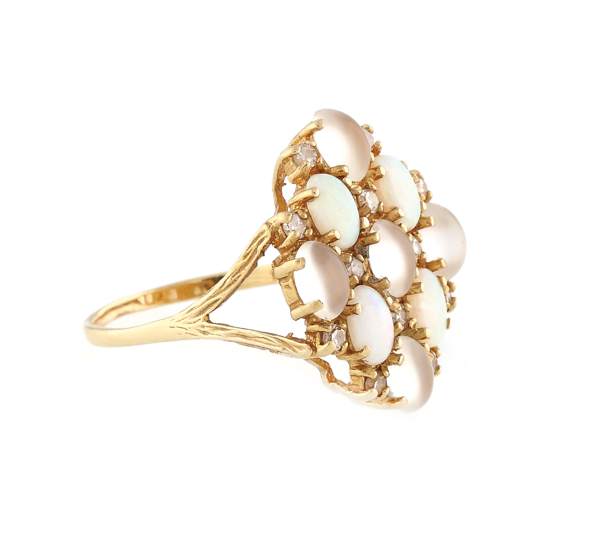 Gold ring ornate with opals, moonstones and diamonds