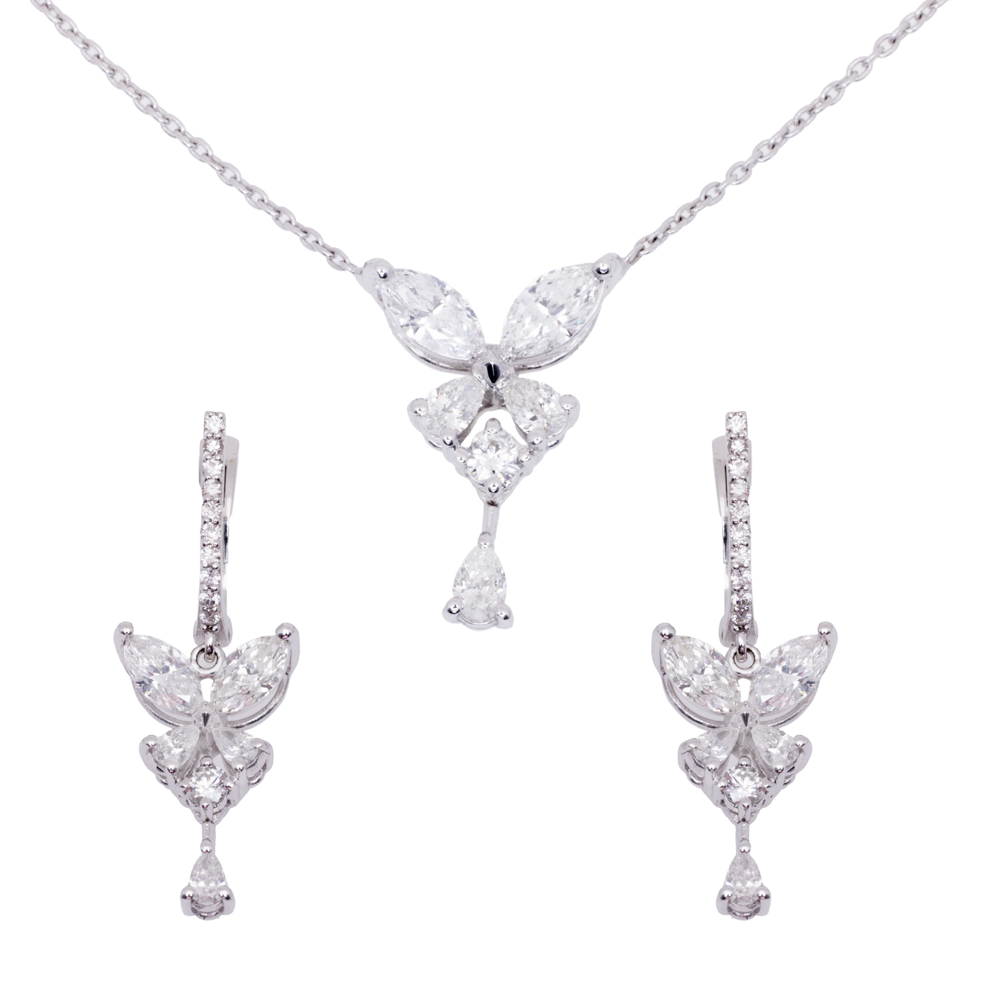 White gold set, decorated with diamonds, consisting of a pendant necklace and earrings