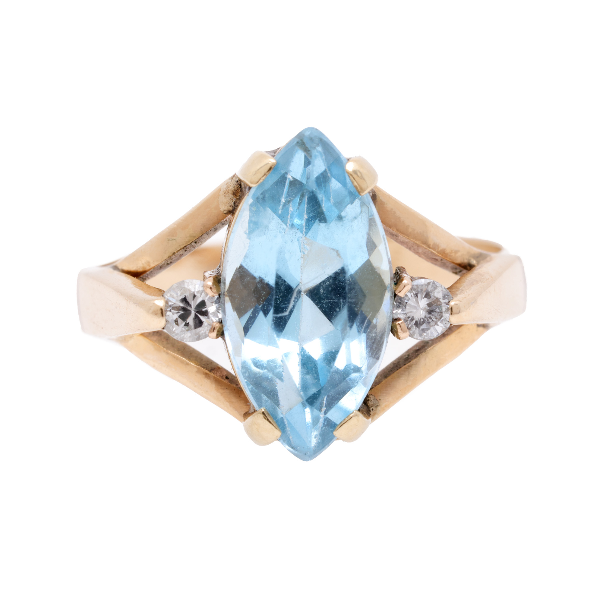 Gold ring, centrally decorated with topaz, surrounded by two diamonds