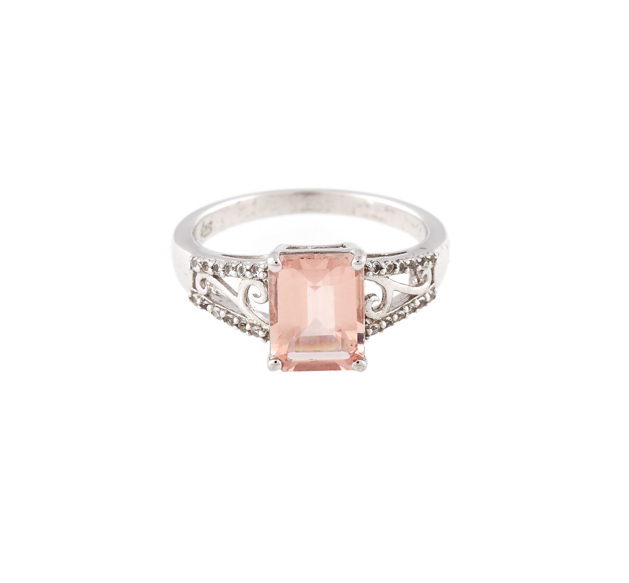 Silver ring decorated with morganite and white topazes