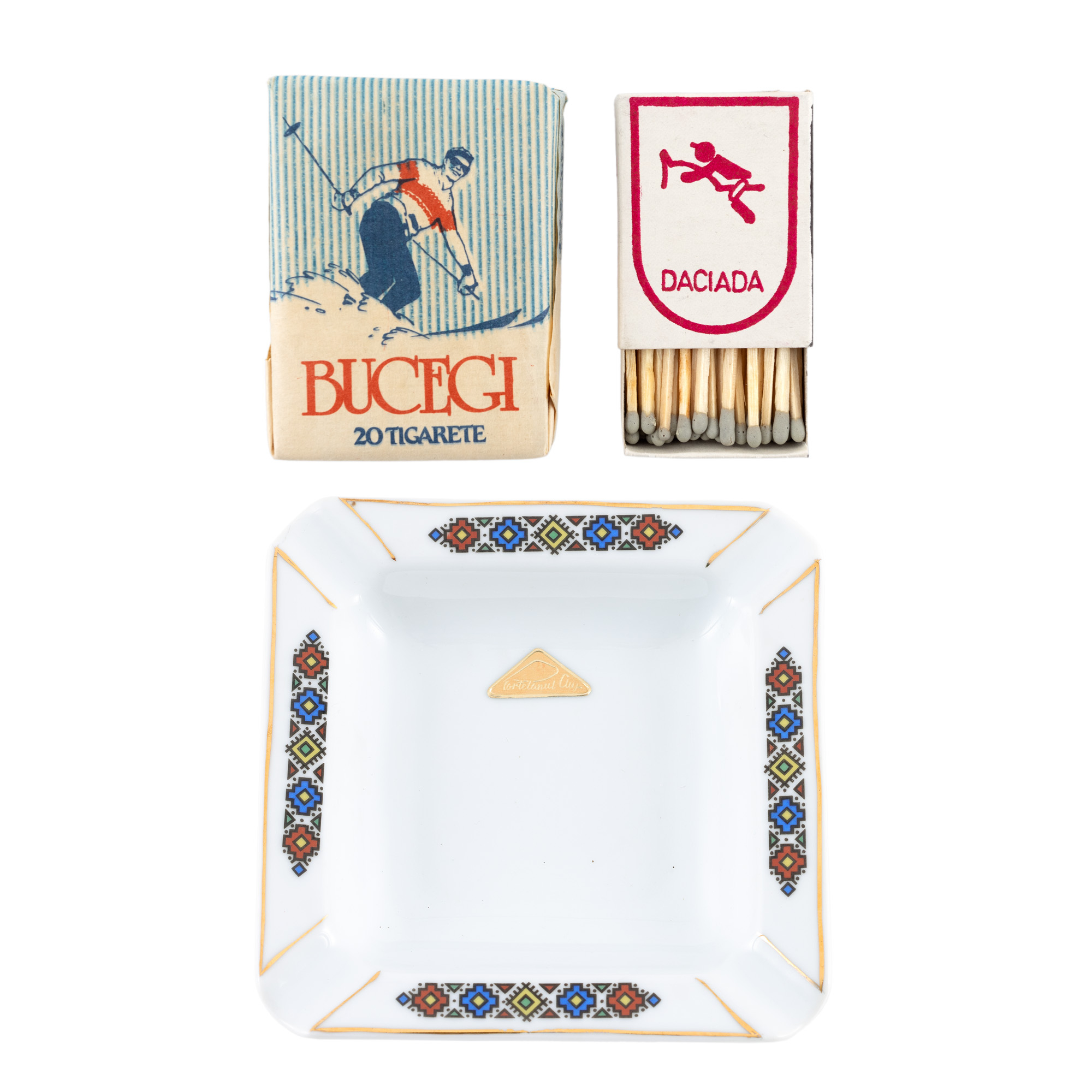 Lot consisting of "Bucegi" cigarette pack, a "Daciada" matchbox, and an ashtray, communist era
