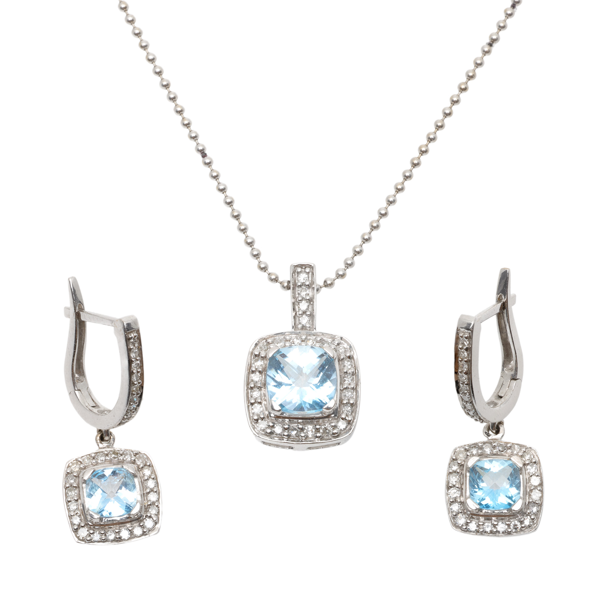 Set consisting of a pair of earrings and pendant necklace, made of white gold, decorated with diamonds and topaz.