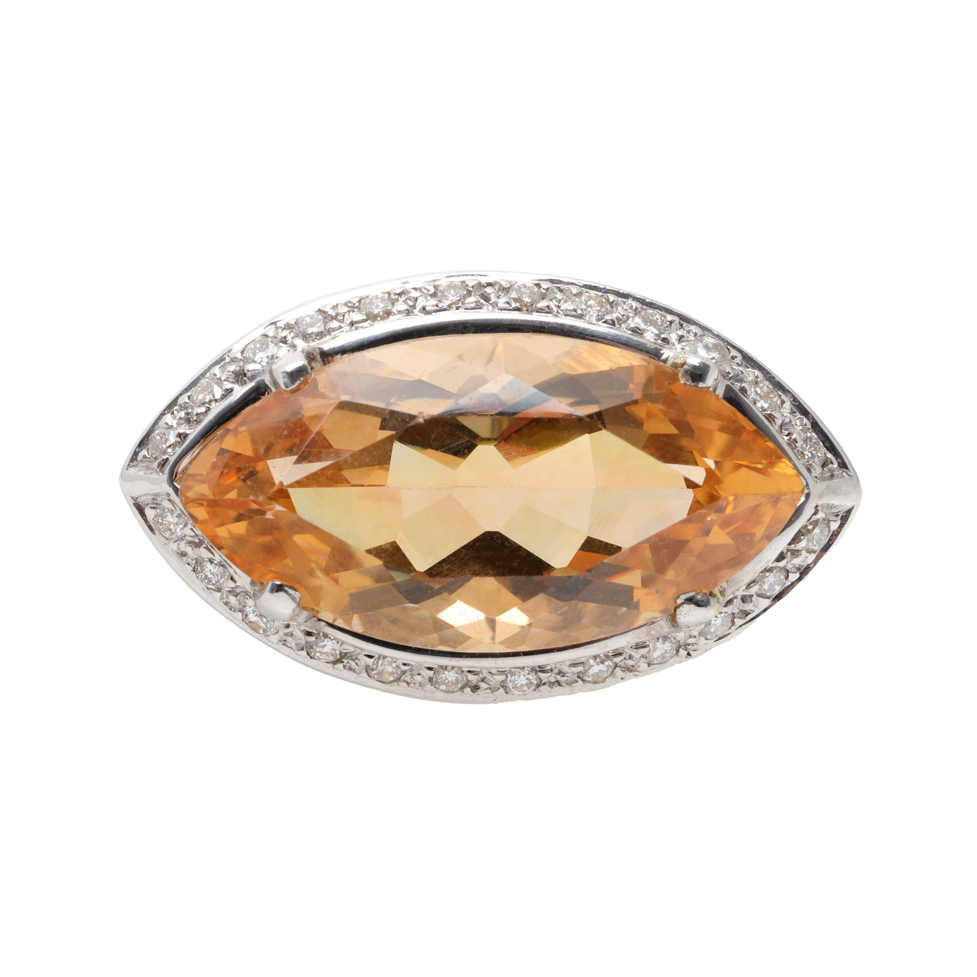 White gold ring, decorated with citrine, surrounded by diamonds