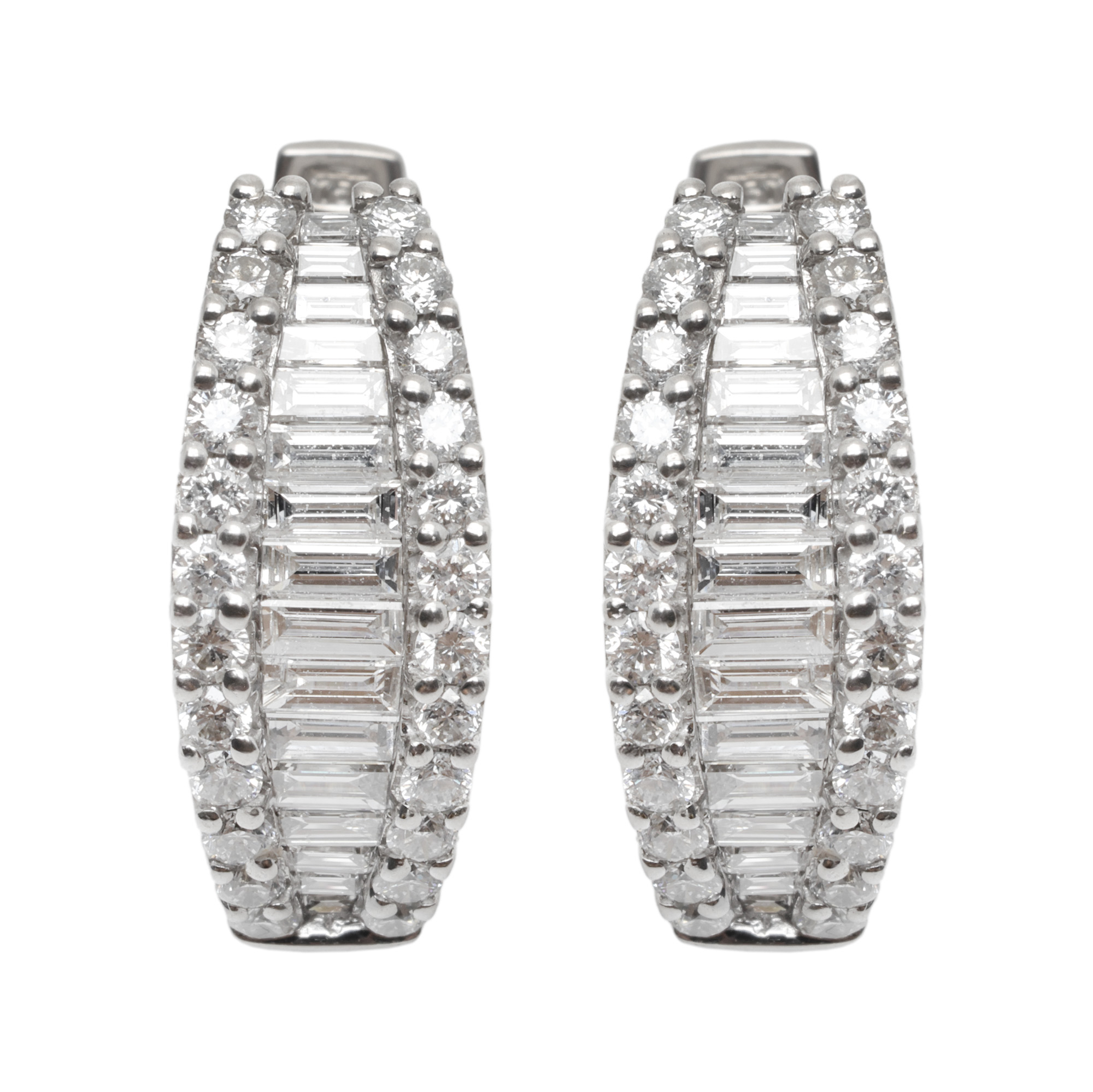 Pair of white gold earrings, decorated with diamonds