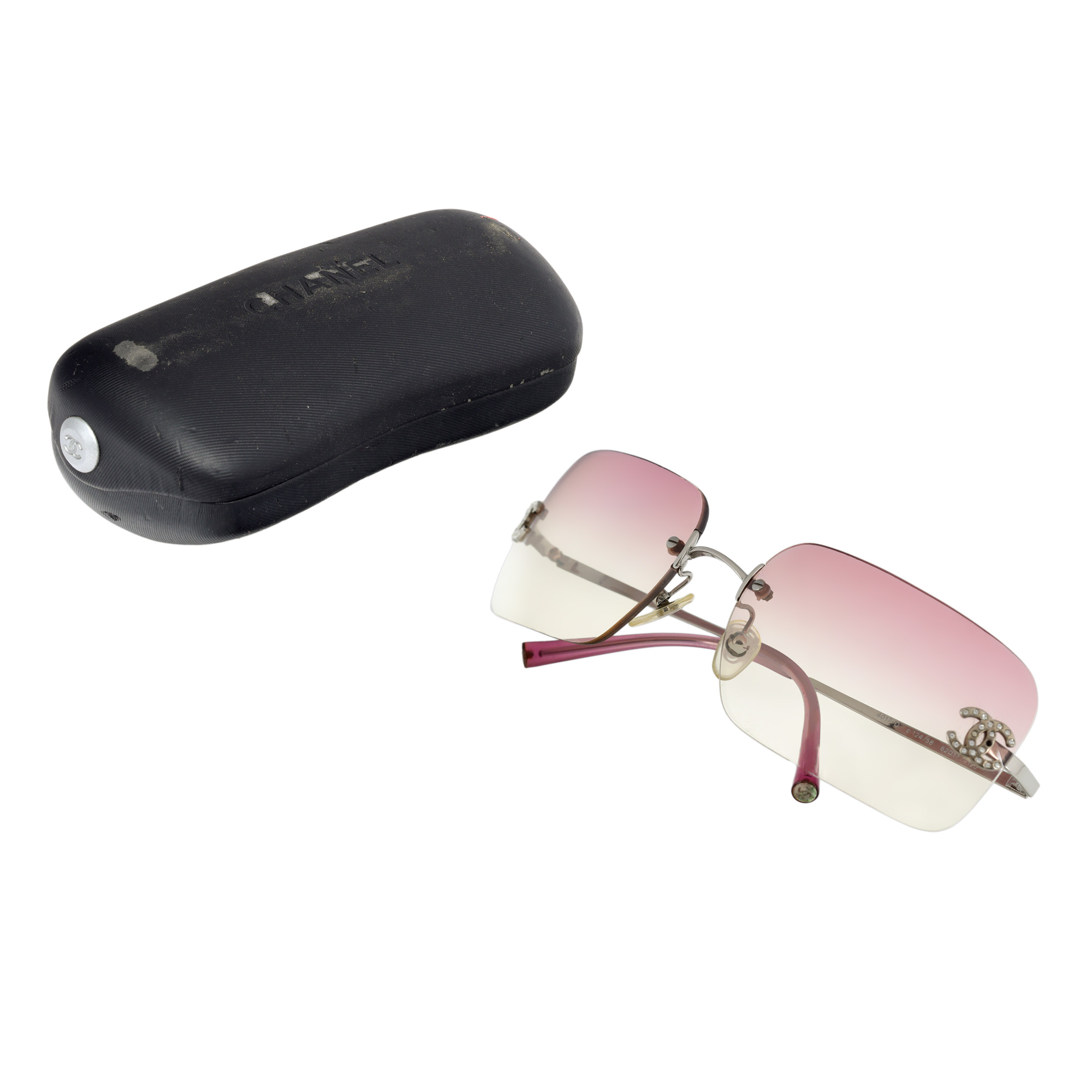 Pereche de ochelari de soare Chanel, model Rimless, cca. 1990, însoțită de etui 