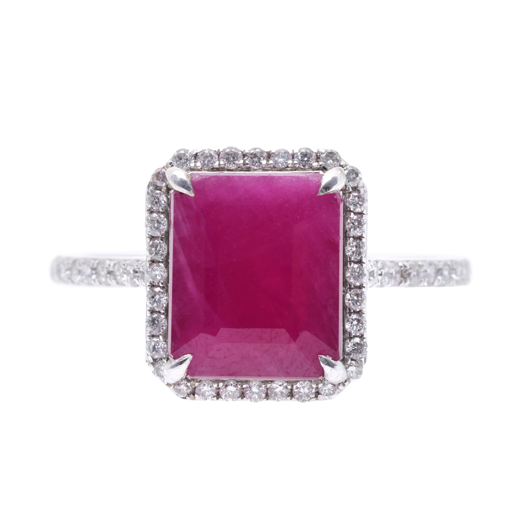 White gold ring, decorated with a central ruby, surrounded by diamonds, accompanied by an IGI certificate