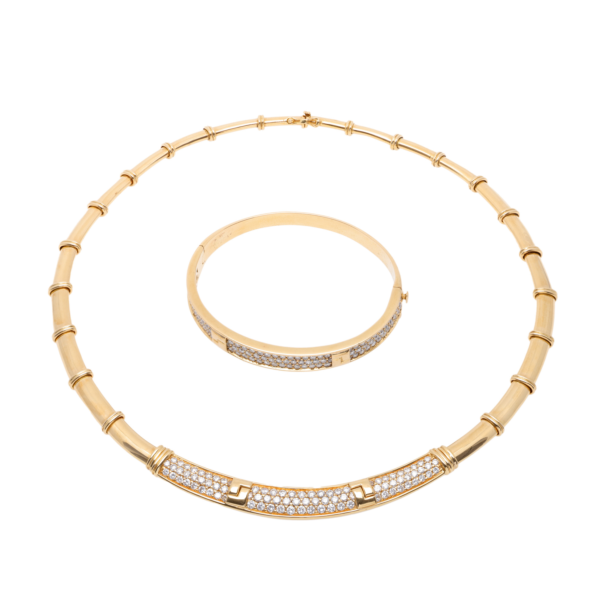 Christofle set consisting of a bracelet and necklace, made of gold, decorated with diamonds, accompanied by the original box
